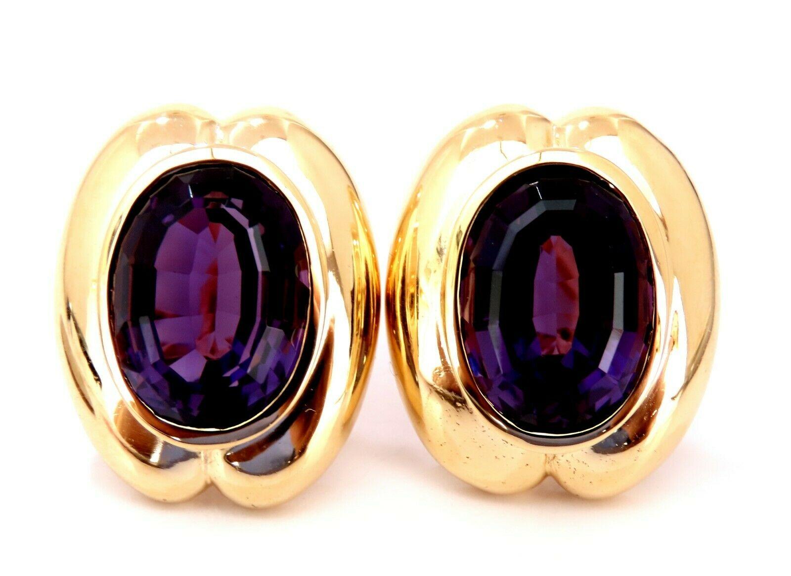 Natural Vivid Purple Amethyst Clip Earrings.

34ct natural vivid purple amethyst.

14x11 mm each

14 karat yellow gold 18.9 grams

Overall earrings: 24 x 20mm

Depth: 10mm

$7000 appraisal to accompany