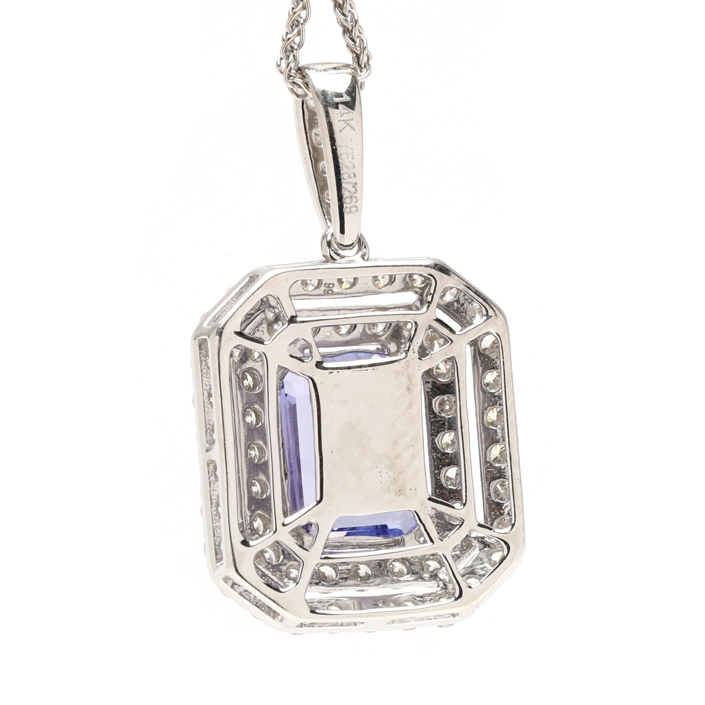 Steine:
Tansanit
Smaragdschliff
9 x 7 mm
etwa 2,5 Karat insgesamt
Diamant
runder Brillantschliff
etwa 0,90 Karat insgesamt
Farbe FG/ Reinheit VS2-SI2

Kettenlänge: 16 Zoll.

Länge des Anhängers: 1 Zoll.

Gewicht: 3,4 dwts / 5,3 Gramm

Briefmarken: