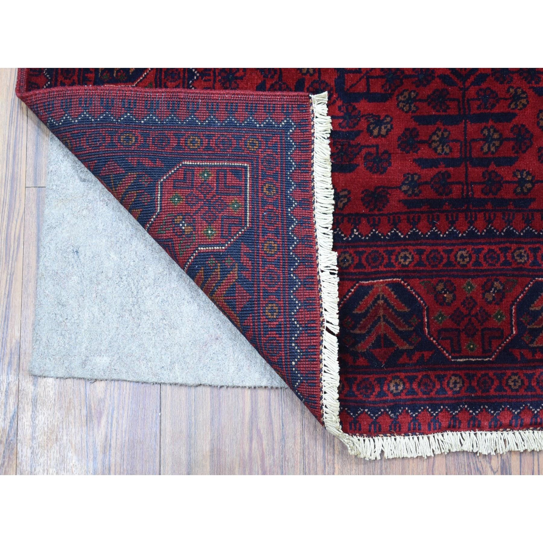 This is a truly genuine one-of-a-kind Afghan Khamyab with Double Medallions Design Soft Afghan Wool Deep and Saturated Red Hand Knotted Oriental Rug. It has been Knotted for months and months in the centuries-old weaving craftsmanship techniques by