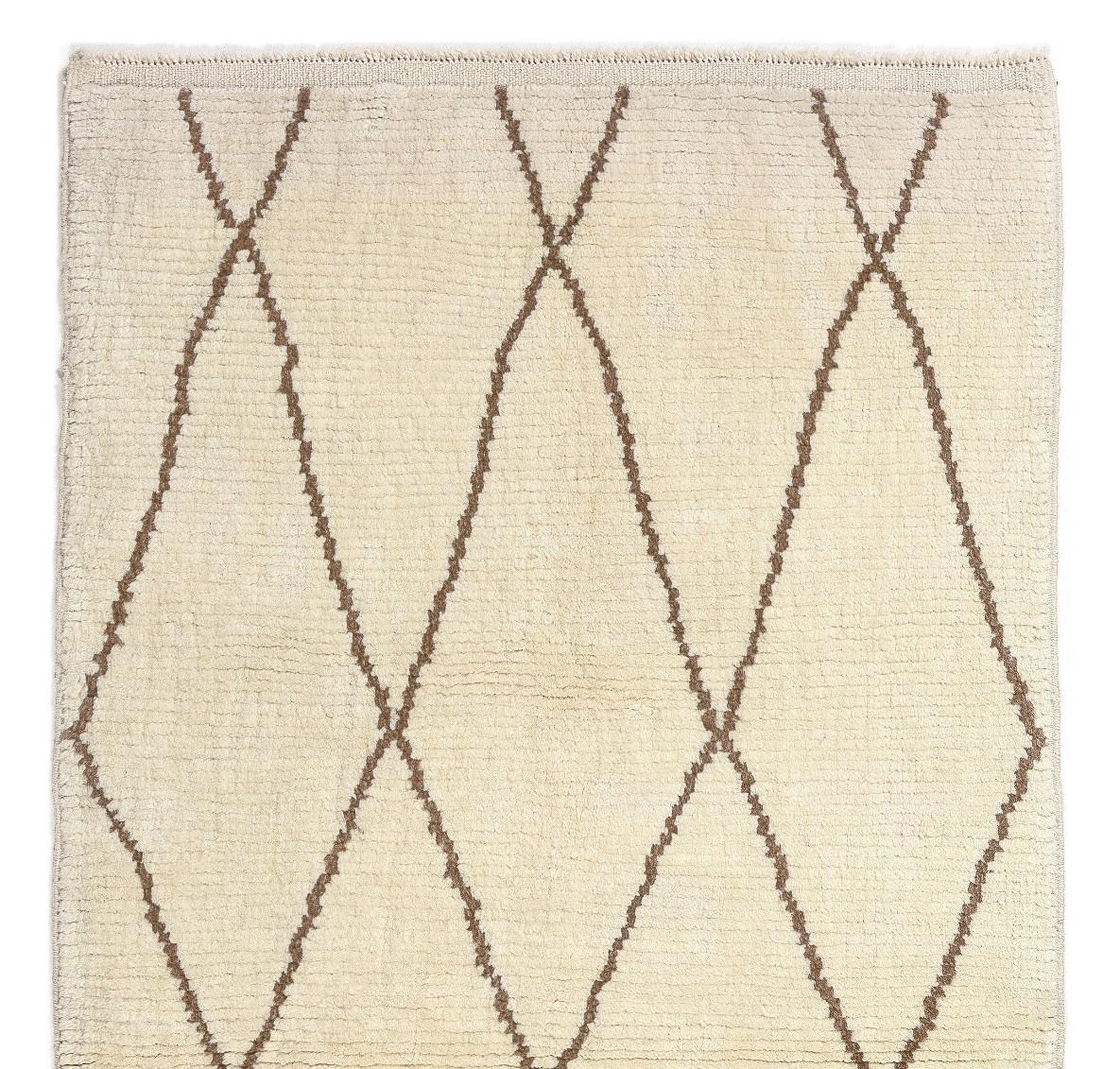 A contemporary hand-knotted Moroccan rug, made of plant dyed sheep wool. 
Soft, comfy pile that is ideal for families with kids. Size 3.4x6 Ft

Available as it is or made to measure in any size and color combination requested.