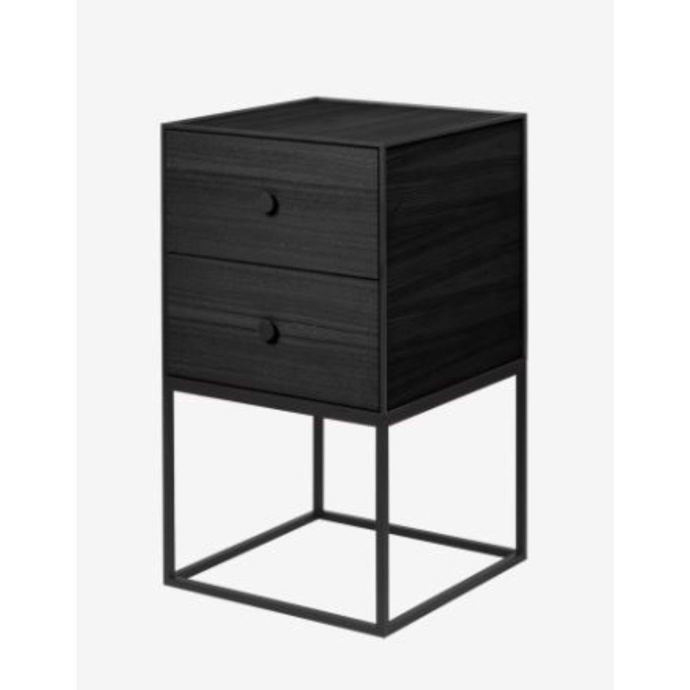 35 black ash frame sideboard with 2 drawers by Lassen.
Dimensions: D 35 x W 35 x H 63 cm. 
Materials: Finér, Melamin, Melamine, Metal, Veneer, Ash
Also available in different colors and dimensions. 
Weight: 15.50 Kg

By Lassen is a Danish