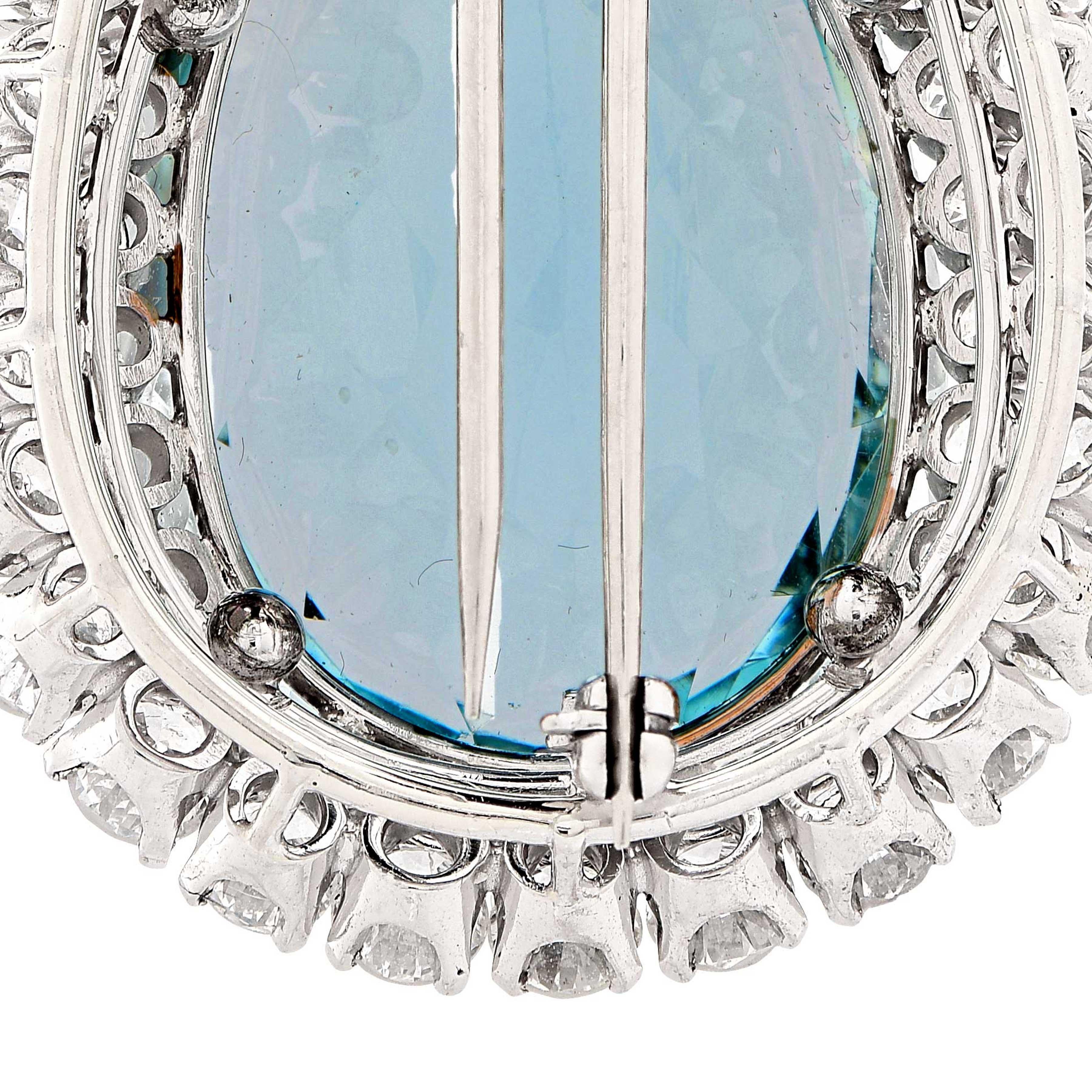 This gorgeous 35 carat aquamarine and diamond platinum brooch features a natural aquamarine surrounded by 62 round brilliant cut diamonds with an estimated total weight of 4.5 carats