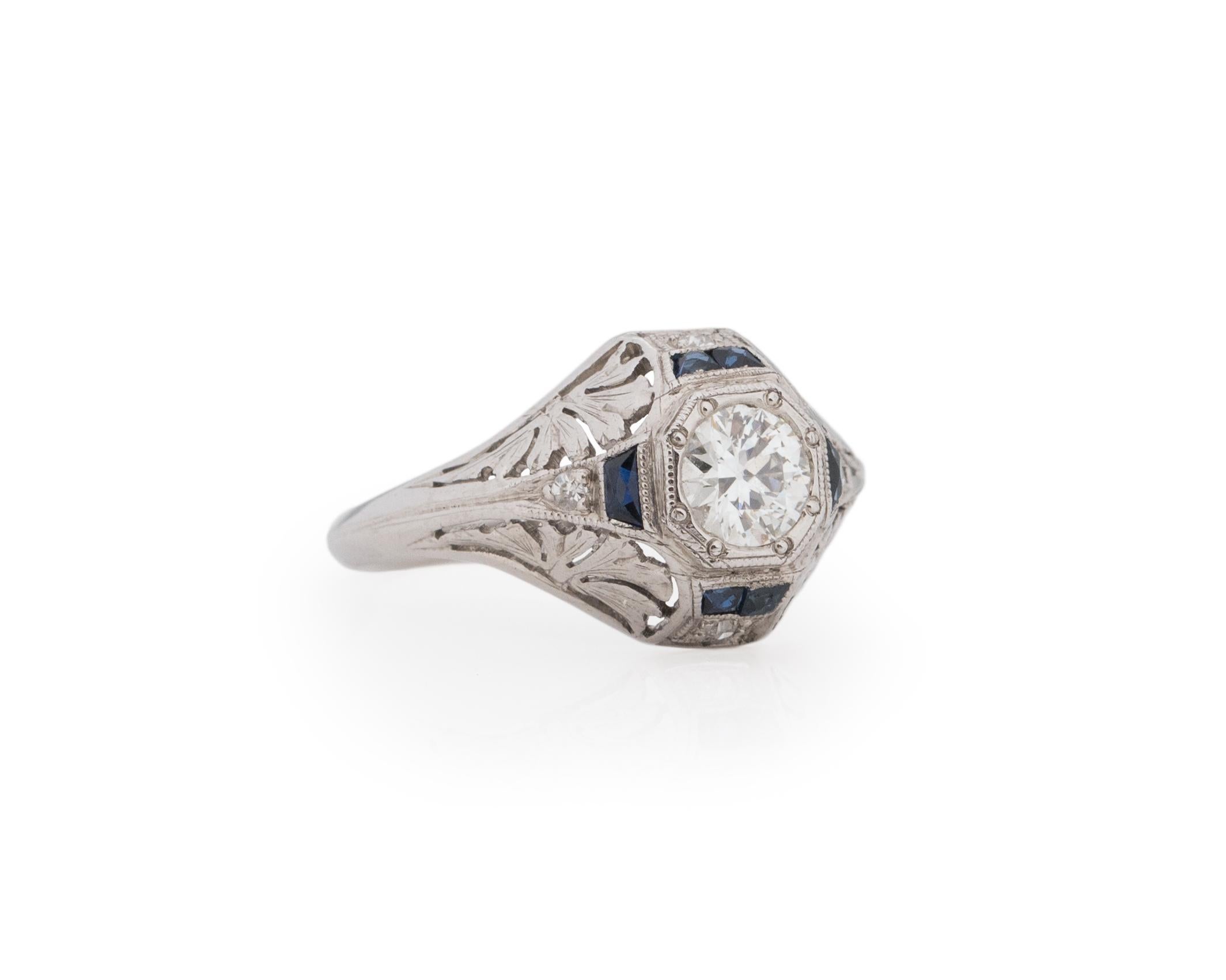 Ring Size: 5.25
Metal Type: Platinum [Hallmarked, and Tested]
Weight: 3.0 grams

Center Diamond Details:
Weight: .35ct
Cut: Old European brilliant
Color: F
Clarity: VS

Sapphire Details: Blue, French Cut, Natural

Finger to Top of Stone Measurement: