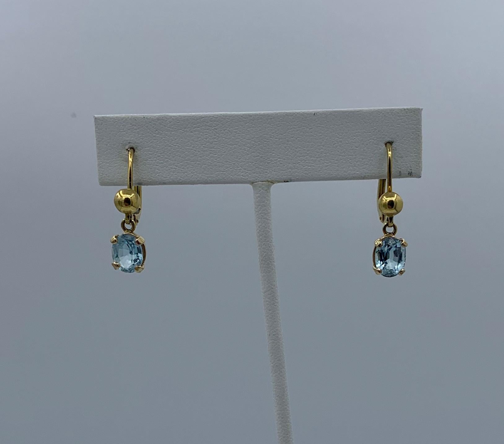 Oval Cut 3.5 Carat Blue Topaz Dangle Earrings 14 Karat Gold Mid-Century Lever Backs