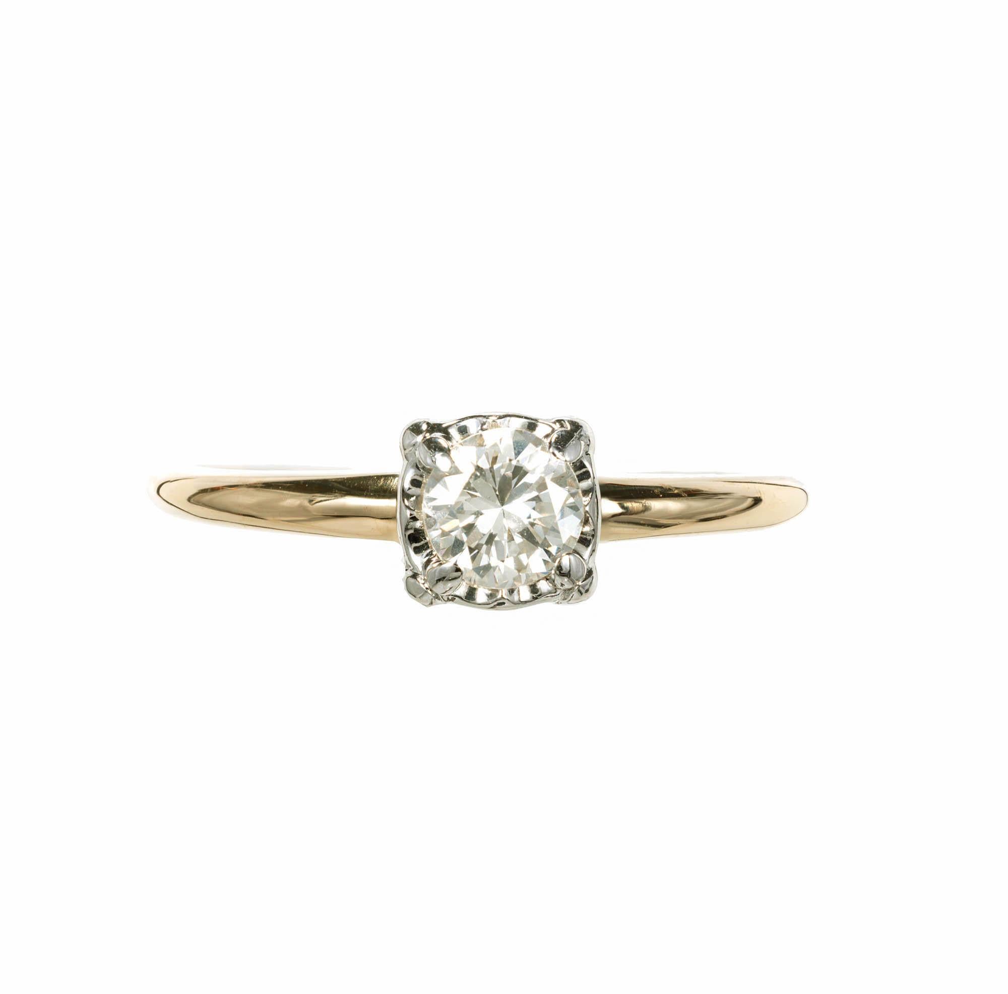 Diamond engagement ring. Round brilliant cut Diamond set in a 14k white gold 4 prong mounting with a 14k yellow gold band.

1 round brilliant cut Diamond, approx. total weight .35cts, I – J, VS1, 4.41 x 4.4 x 2.75mm, EGL certificate #