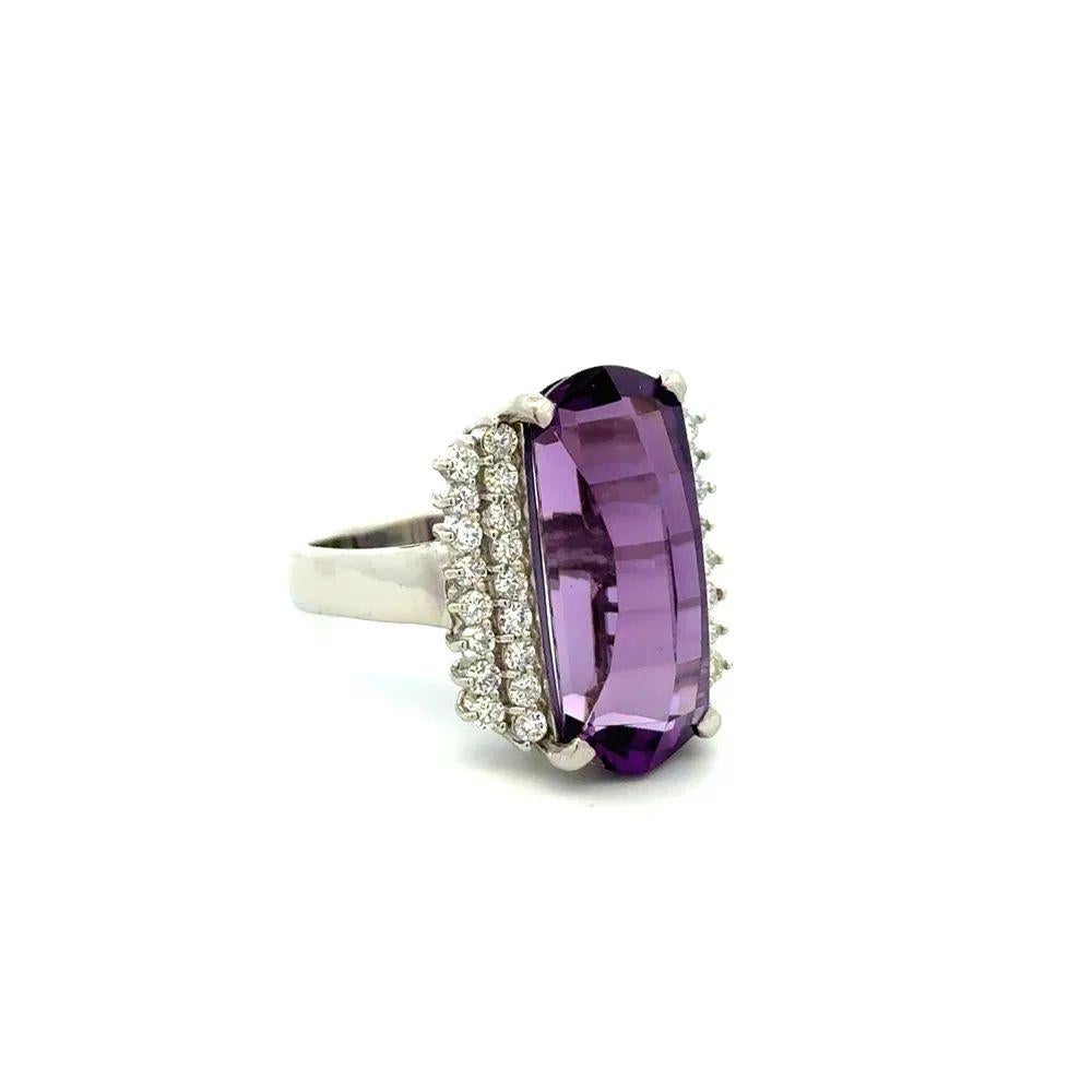 Simply Beautiful! Vintage Elongated Fancy Amethyst and Round Brilliant Cut Diamond Platinum Cocktail Ring. Centering a securely nestled and Hand set 3.5 Carat Elongated Fancy Amethyst. Accented by RBC Diamonds, weighing approx. 0.73tcw. Hand crafted