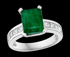 3.5 Carat Emerald Cut Emerald and 0.5 Carat Diamond Ring 14 Karat White Gold