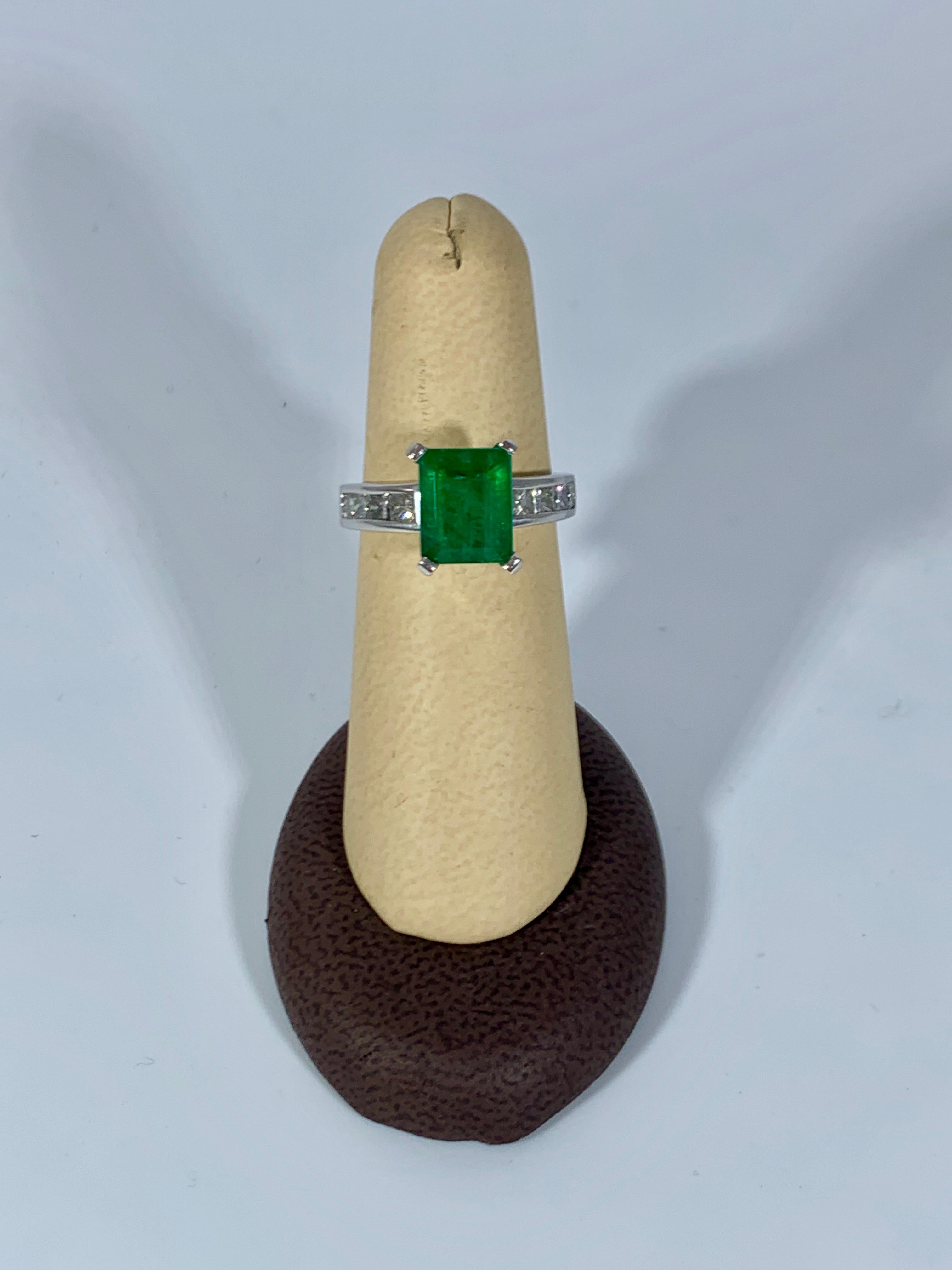 3.5 Carat Emerald Cut Emerald and 0.5 Carat Diamond Ring 14 Karat White Gold In Excellent Condition For Sale In New York, NY