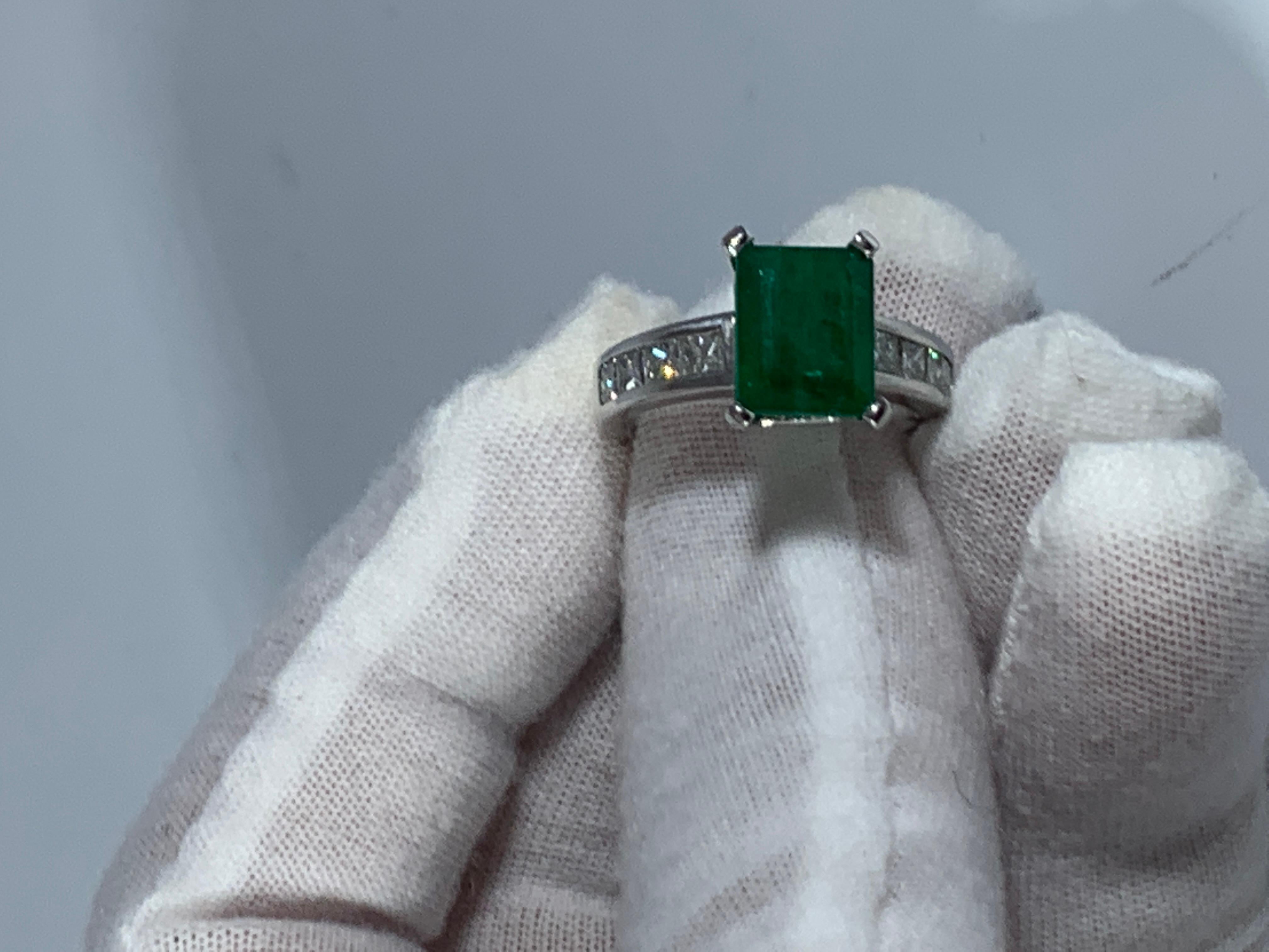 Women's 3.5 Carat Emerald Cut Emerald and 0.5 Carat Diamond Ring 14 Karat White Gold For Sale