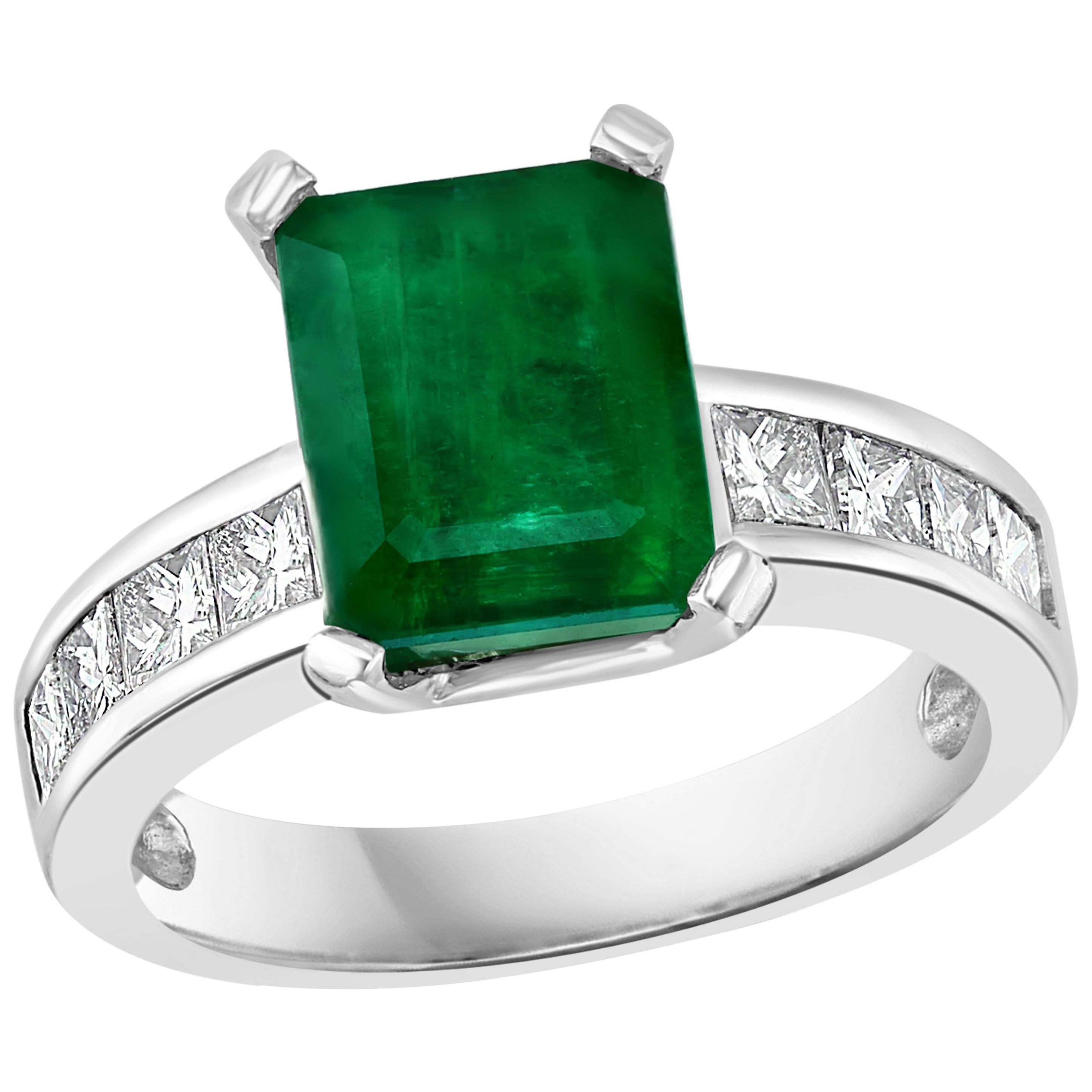 3.5 Carat Emerald Cut Emerald and 0.5 Carat Diamond Ring 14 Karat White Gold