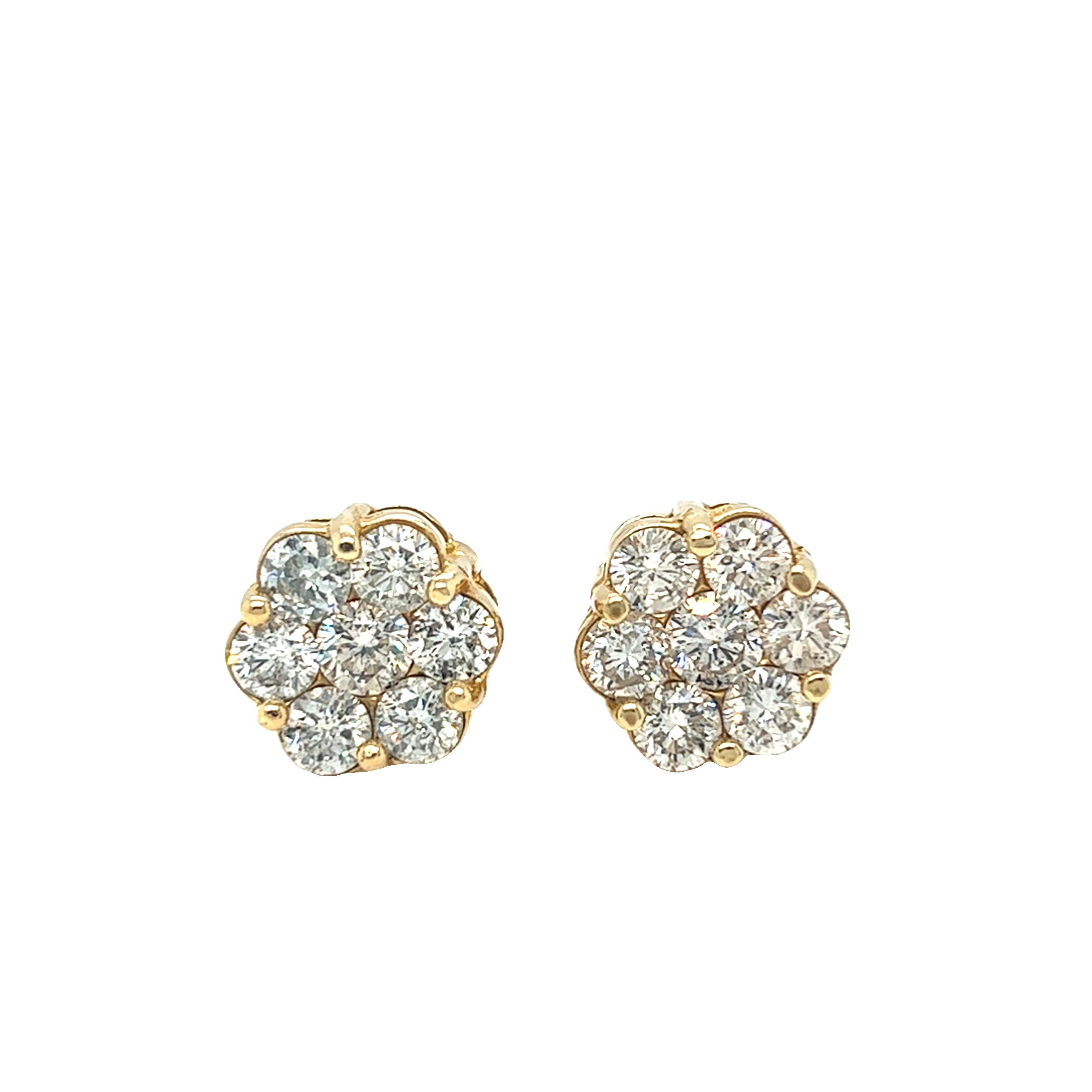 Fun and beautiful earrings for daily wear or a night out. Keep it simple and elegant. These vintage blossom flower stud earrings make a sparkling and bold statement.  Each earring features seven round brilliant cut diamonds, about 0.25 carat each