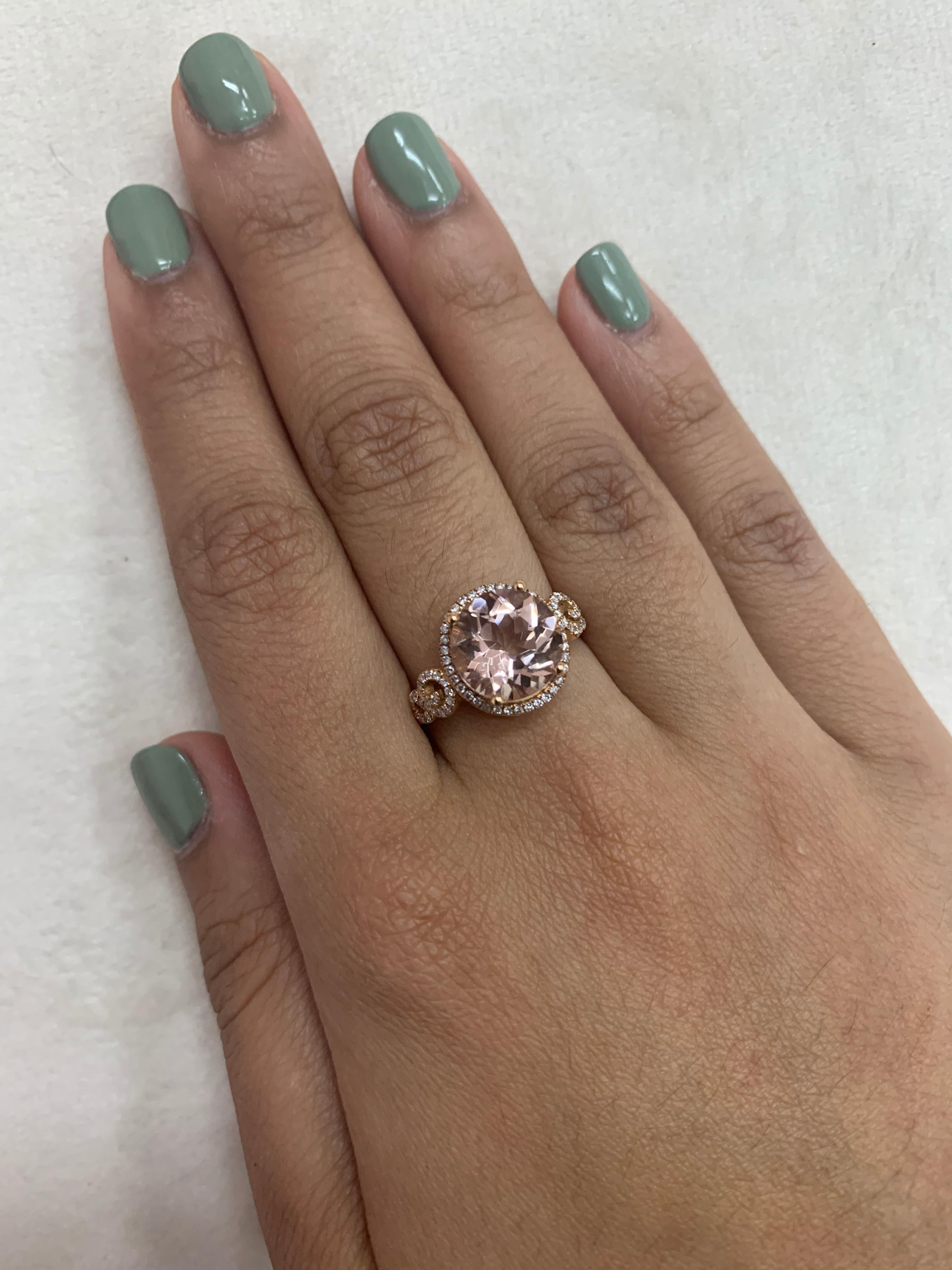 This collection features an array of magnificent morganites! Accented with diamonds these rings are made in rose gold and present a classic yet elegant look. 

Classic morganite ring in 18K rose gold with diamonds. 

Morganite: 3.59 carat oval
