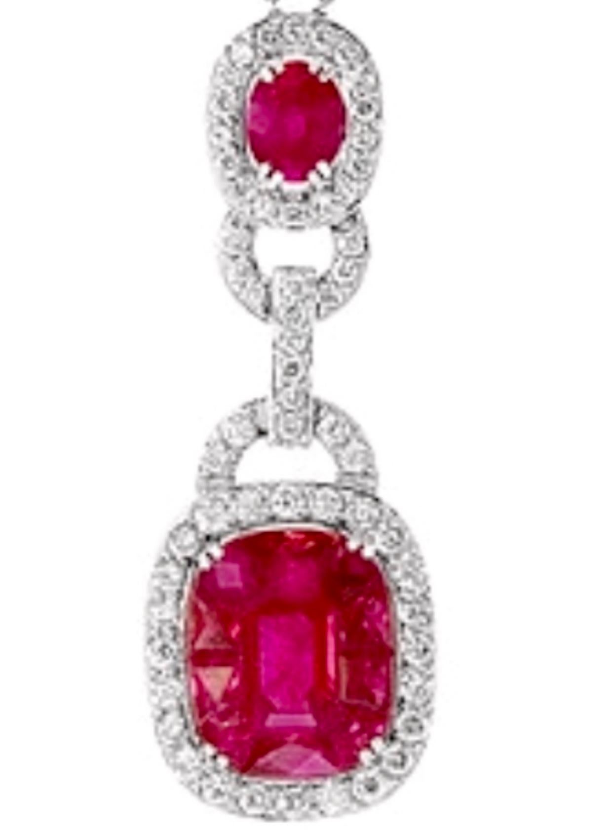 3.5 Carat Natural Burma Ruby and Diamond Pendant Necklace 18 Karat Gold 
This spectacular Pendant Necklace consisting of natural Burma ruby. One Emerald shape ruby piece in the center which look like a single piece but in fact there is a center