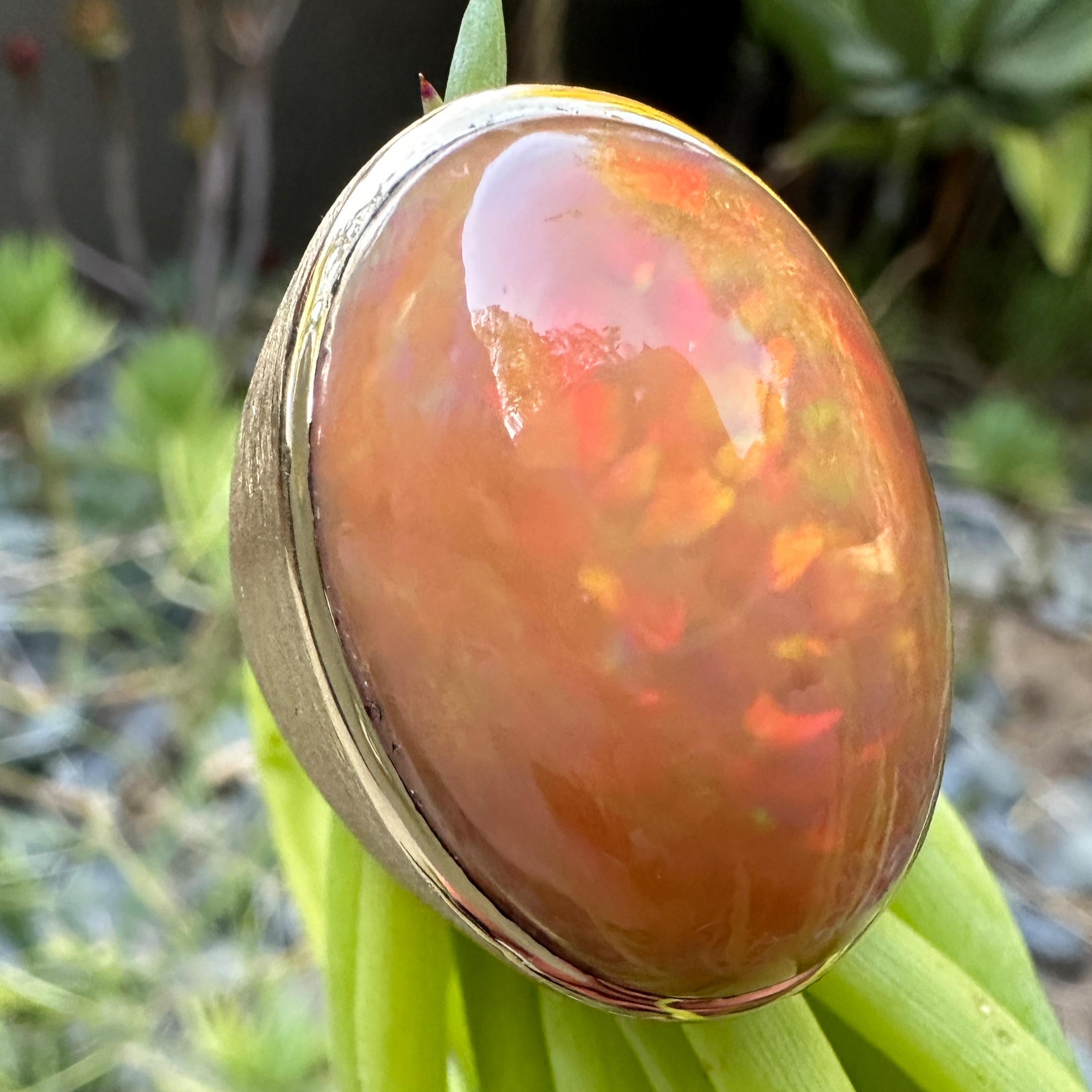 Contemporary 35 Carat Orange Ethiopian Opal in Brushed 18 Karat Yellow Gold Cocktail Ring For Sale