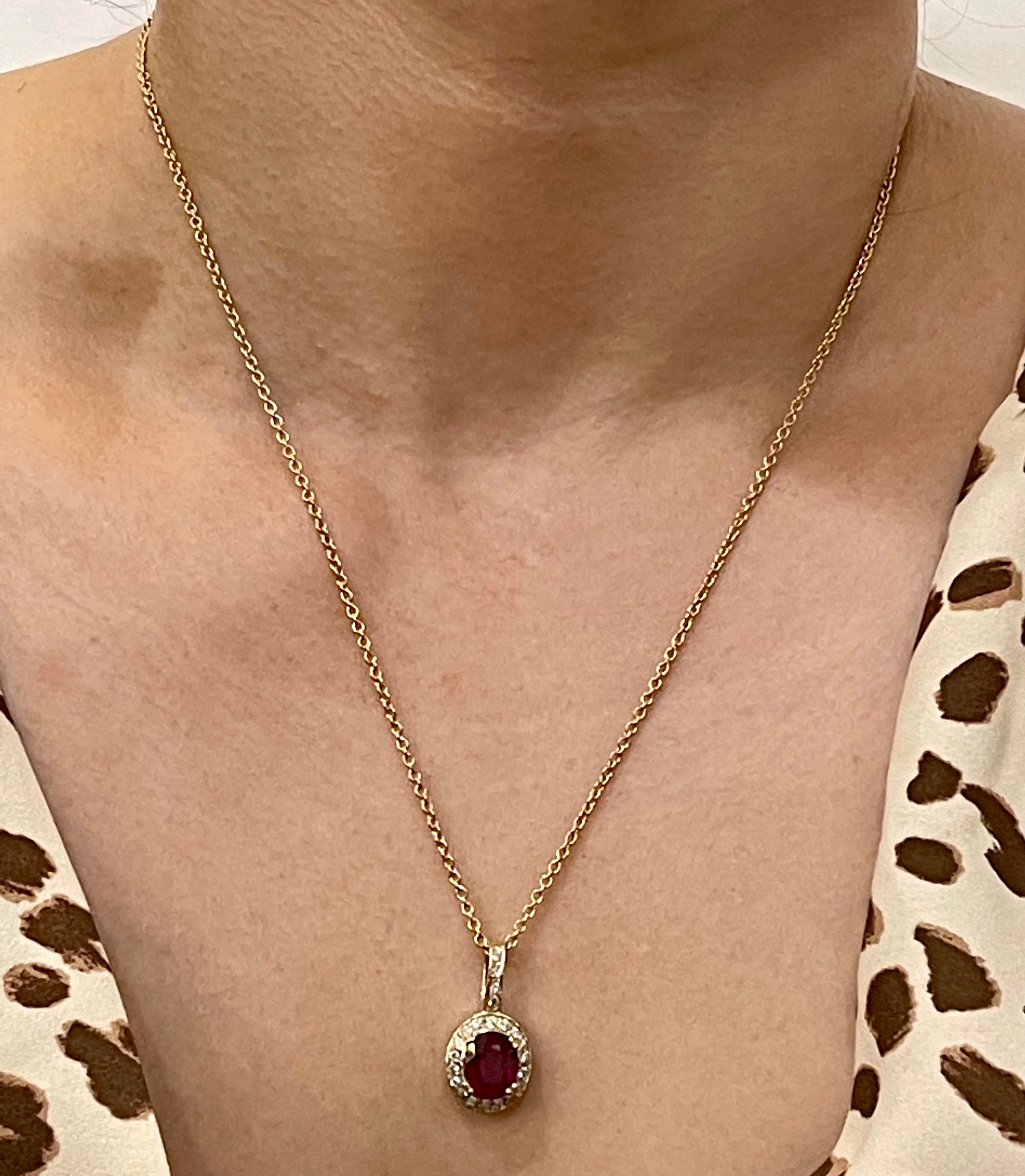 3.5 Carat Oval Cut Ruby Pendant with Diamonds 14 Karat Yellow Gold Chain In Excellent Condition In New York, NY