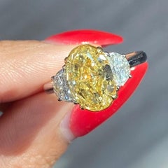 3.5 Carat Oval Diamond Ring Fancy Yellow 14K White Gold Sunlit Royal Radiance
