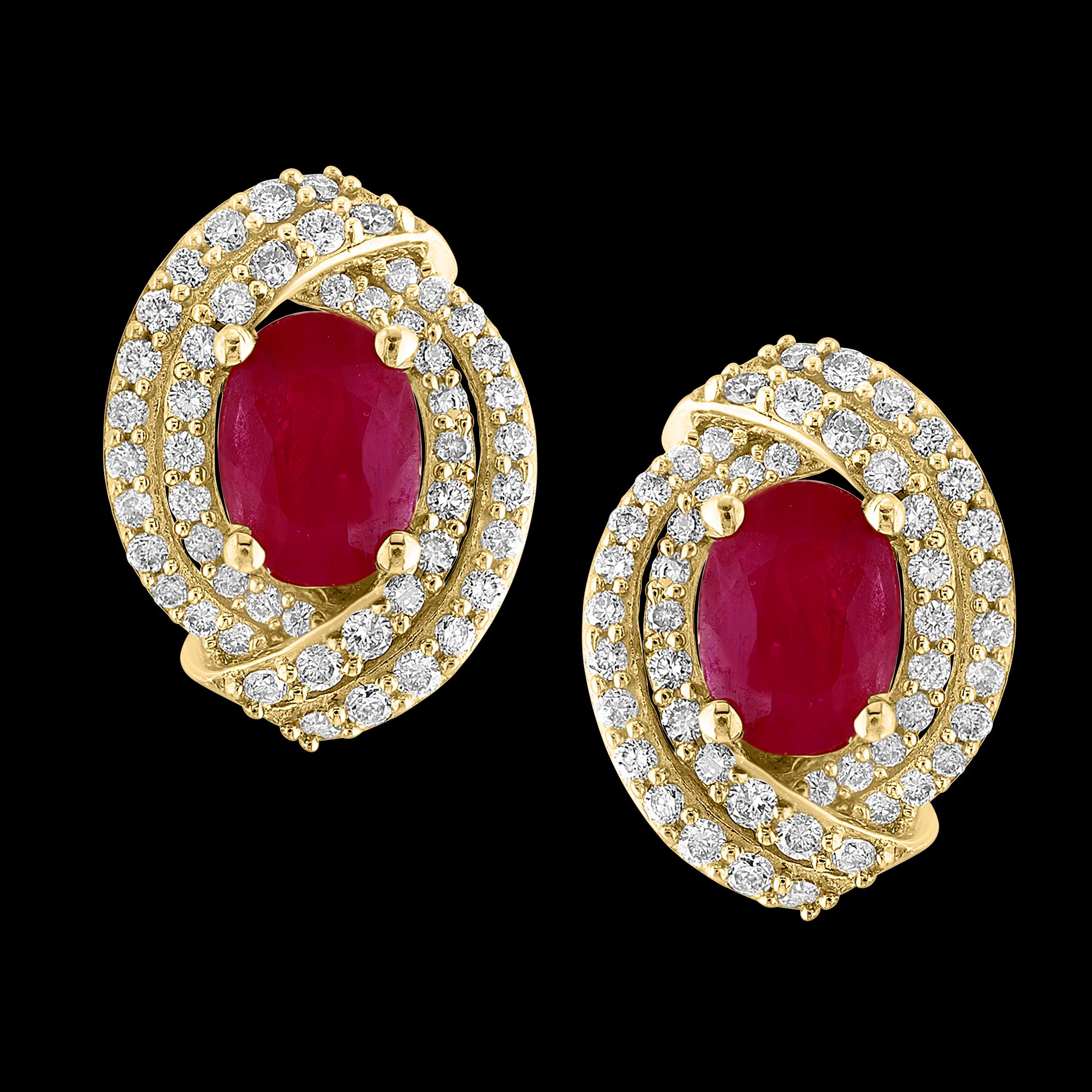 Experience the beauty and elegance of these stunning stud earrings, featuring a captivating combination of a 3.5 carat oval ruby and 1.2 carat brilliant cut diamonds. Expertly crafted with 14 karat yellow gold, these earrings offer a timeless and