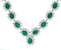 30 Carat Oval Shape Natural Emerald & 23 Carat Diamond Necklace in 18 Karat Gold