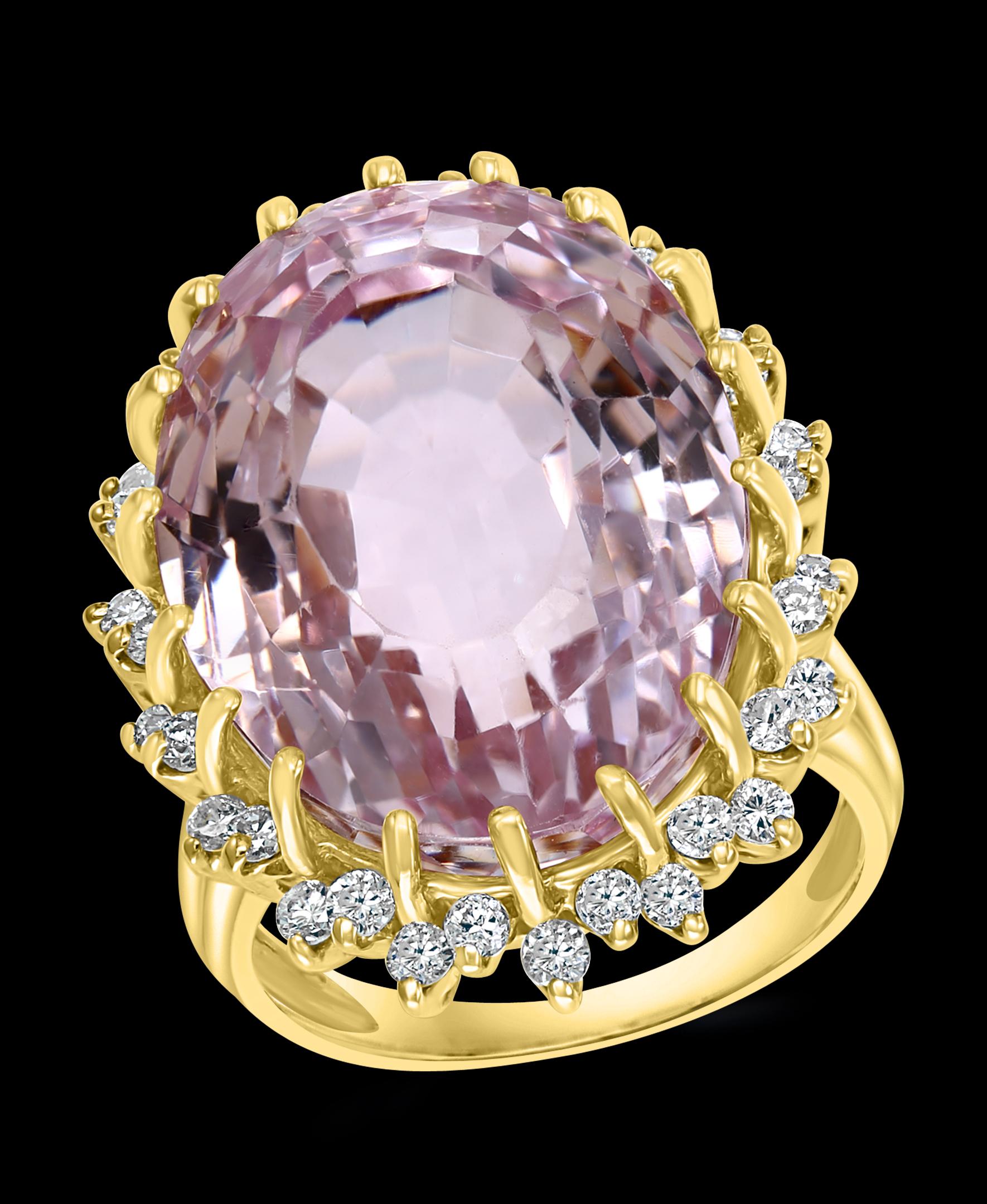 35 Carat Pink Amethyst and  Diamond Cocktail Ring in 14 Karat Yellow Gold Size 9

This is a Beautiful Cocktail ring ring which has a  large approximately 35  carat of high quality Amethyst . Color and clarity is extremely nice. 
Large Oval cut  Pink