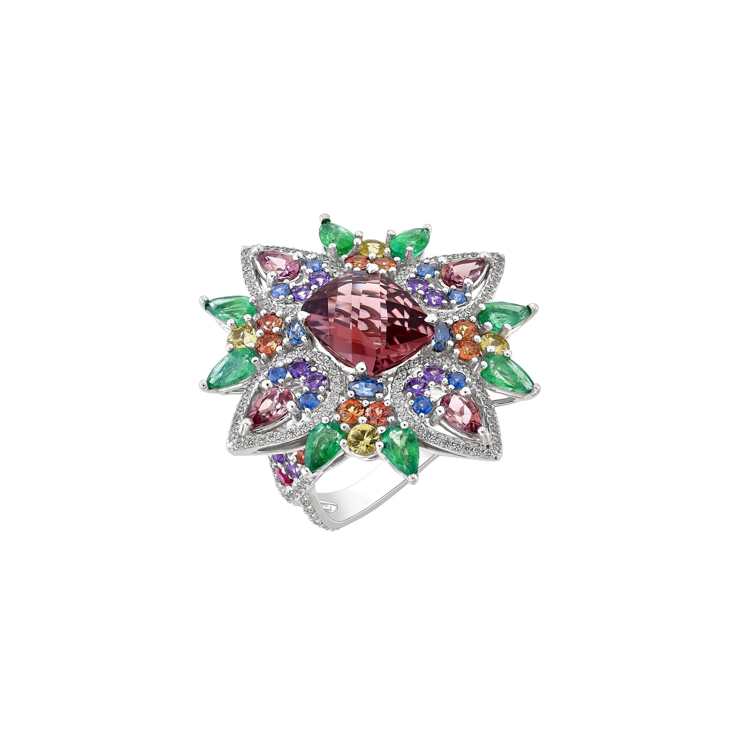 This 18k white gold ring houses a natural loupe clean 3.5 carat pink tourmaline as the centre stone. Inspired by fireworks, the explosion of colors are made with natural and high quality gems. Emeralds, coloured sapphires, diamonds, rubellites and