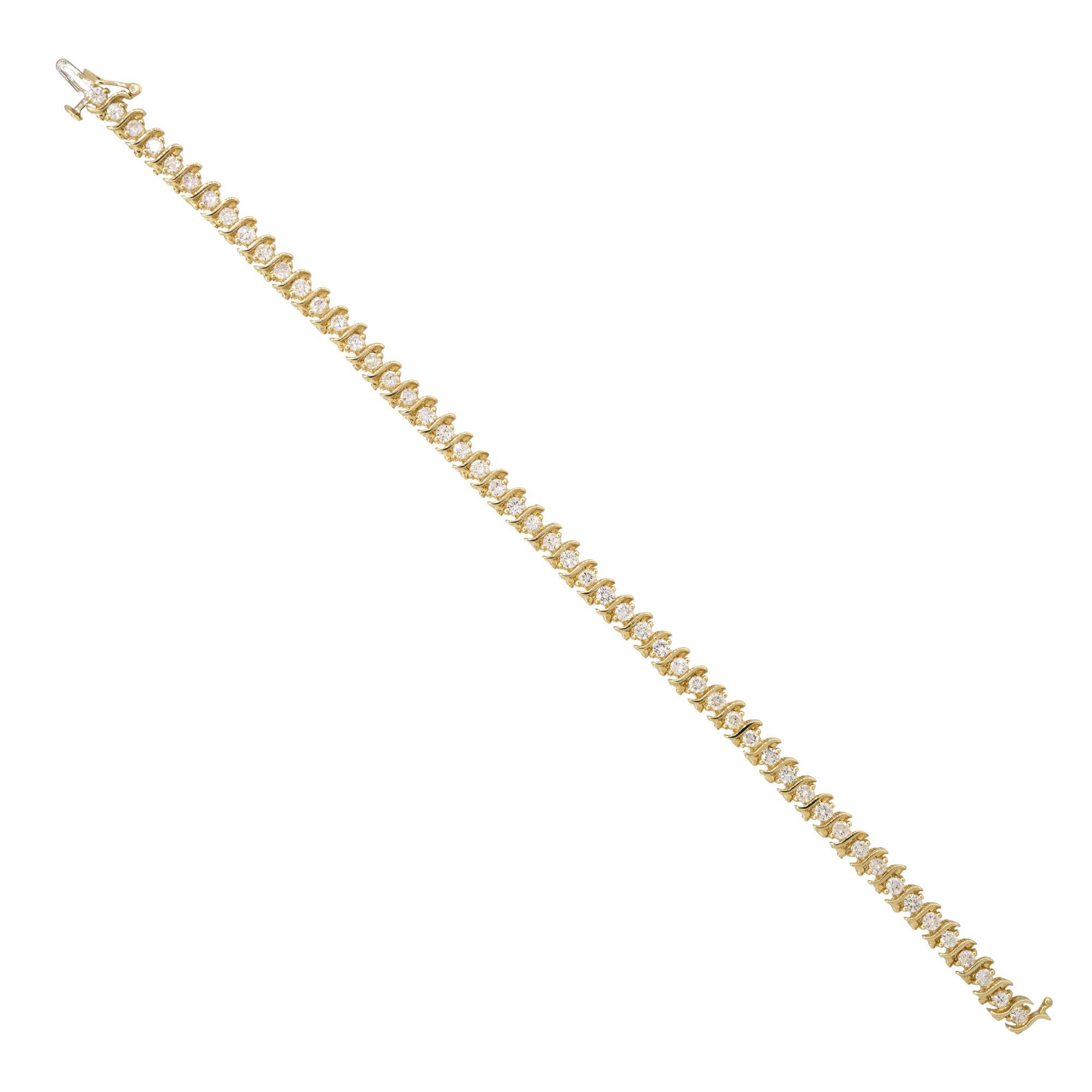 14 Karat Yellow Gold 3.5 Carat Round Brilliant Cut Diamond S-Link Tennis Bracelet
Material: 14k Yellow Gold
Diamond Details: There are approximately 3.5 carats of round brilliant-cut diamonds (52 stones)
Diamond Clarity: All diamonds are