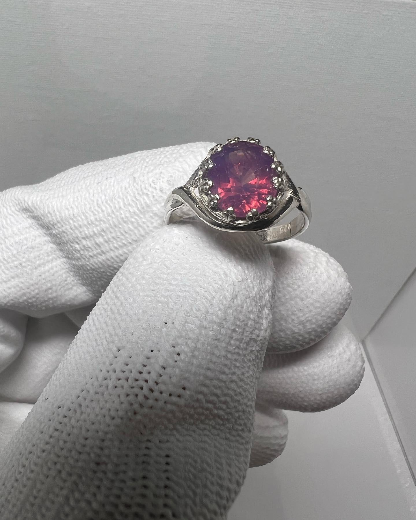 This EyeClean 3.5 Carat Reddish Pink with Blue Hue Kashmir Sapphire comes from the Batakundi Kashmir mine and has a  very beautiful eye catching color. It’s bright and lively and rare to possess in this size , clarity and color . It’s a very clean