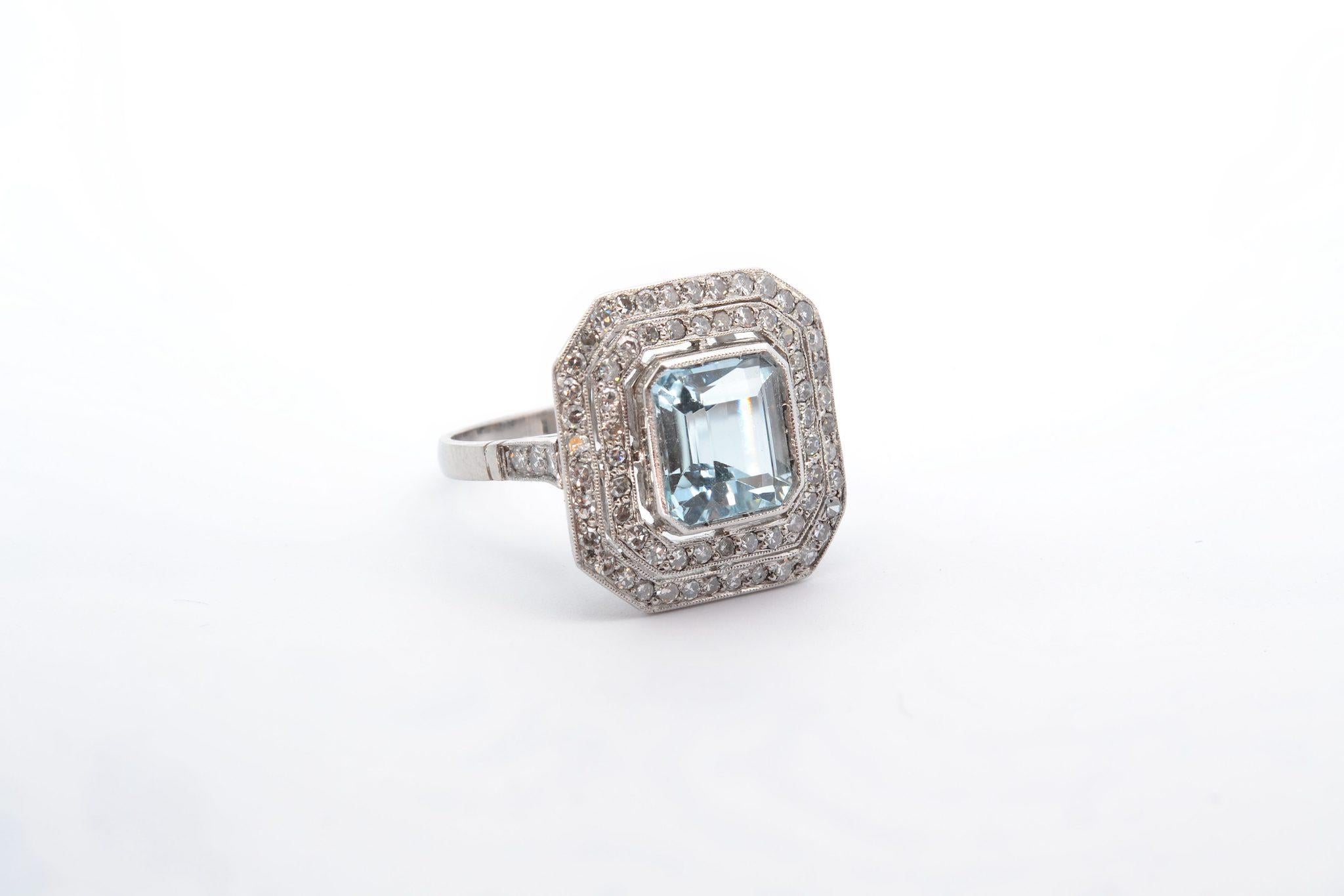 Octagon Cut 3.5 carats aquamarine ring with diamonds For Sale
