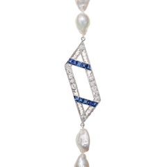 3.5 Carats Diamonds and Sapphires in Platinum with South Sea Pearl Necklace