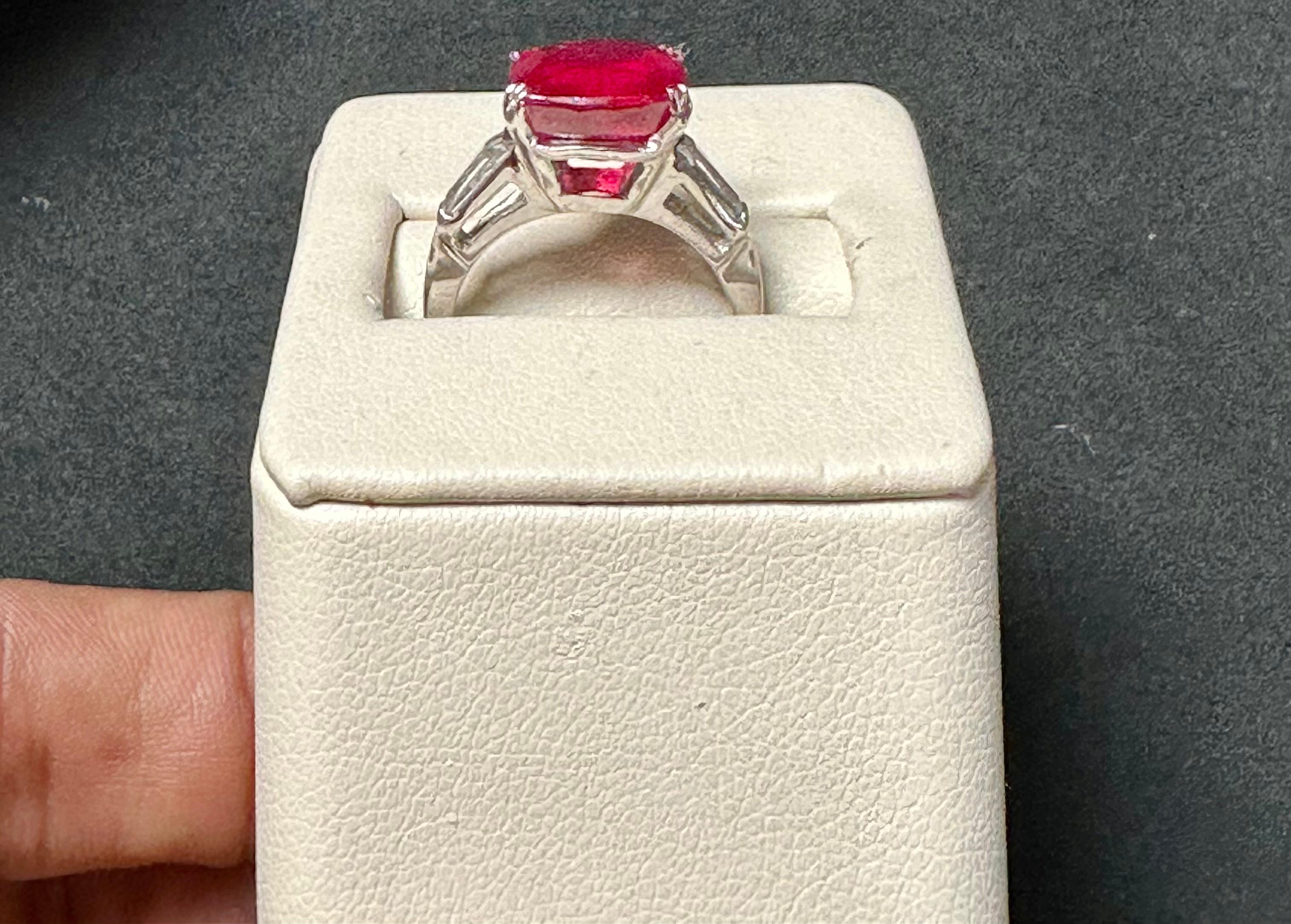 3.5 Ct Cushion Treated Ruby 14 Karat White Gold Ring With Two Baguette Diamonds For Sale 4