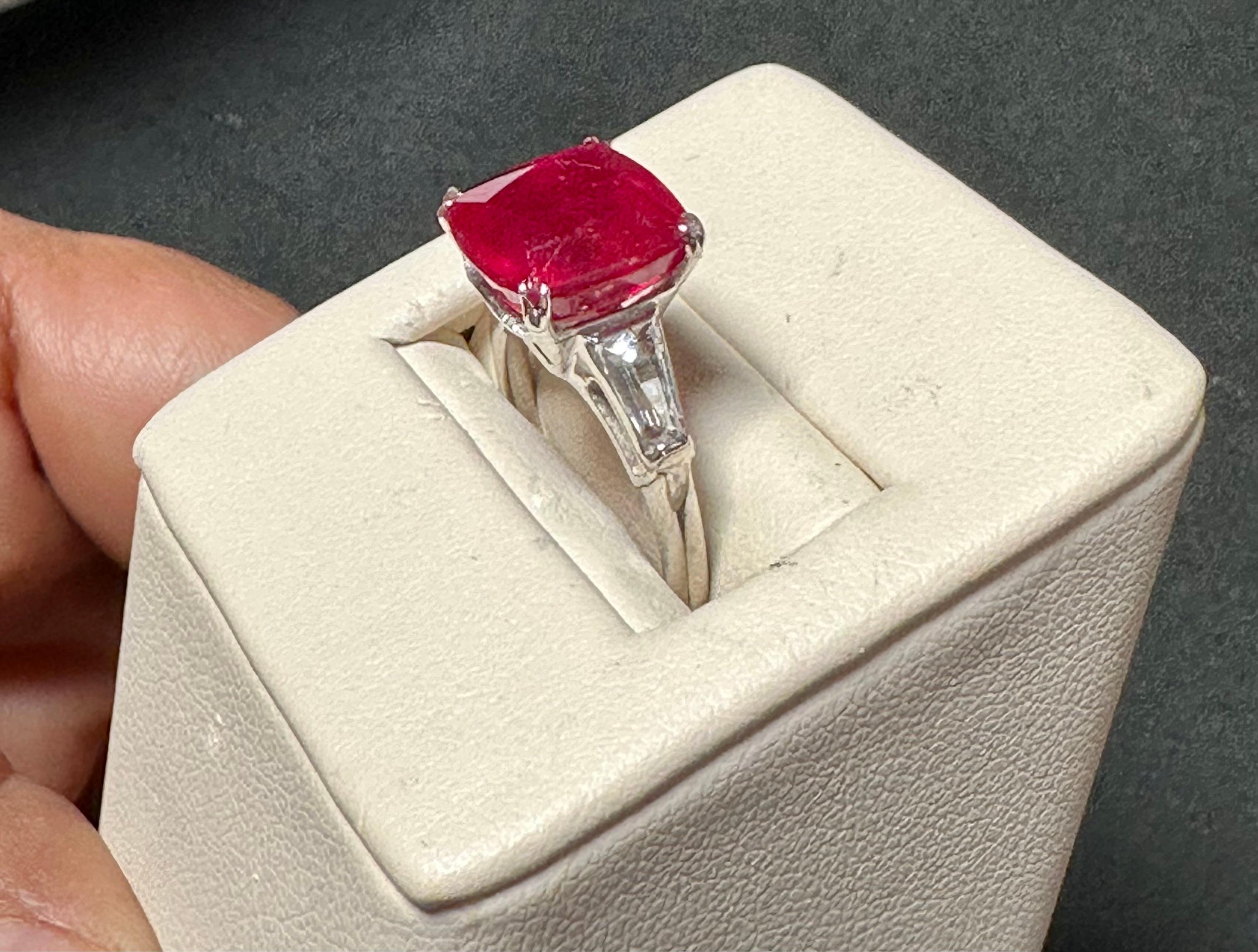 3.5 Ct Cushion Treated Ruby 14 Karat White Gold Ring With Two Baguette Diamonds For Sale 3