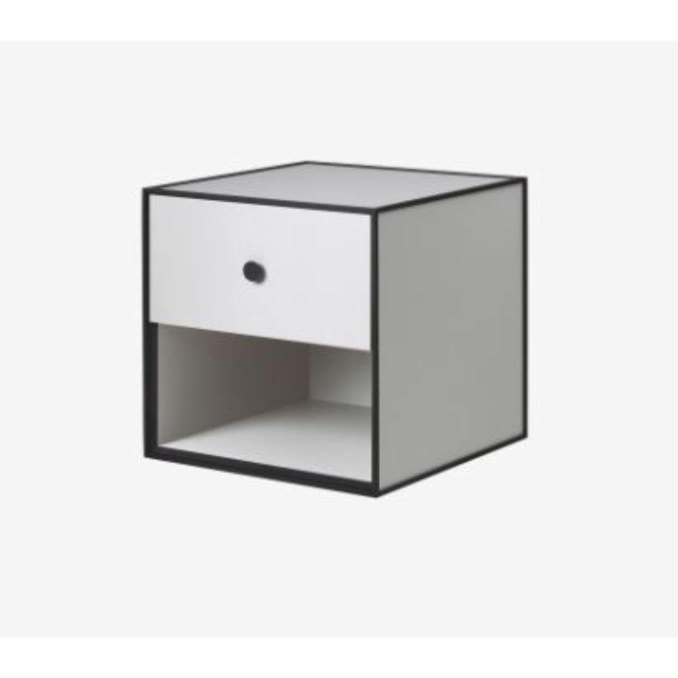 35 light grey frame box with 1 drawer by Lassen
Dimensions: W 35 x D 35 x H 35 cm 
Materials: Finér, Melamin, Melamin, Melamine, Metal, Veneer,
Also available in different colors and dimensions. 

By Lassen is a Danish design brand focused on