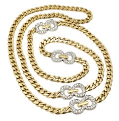 Cuban Link Necklace with Diamond Infinity Stations in 18 Karat Gold