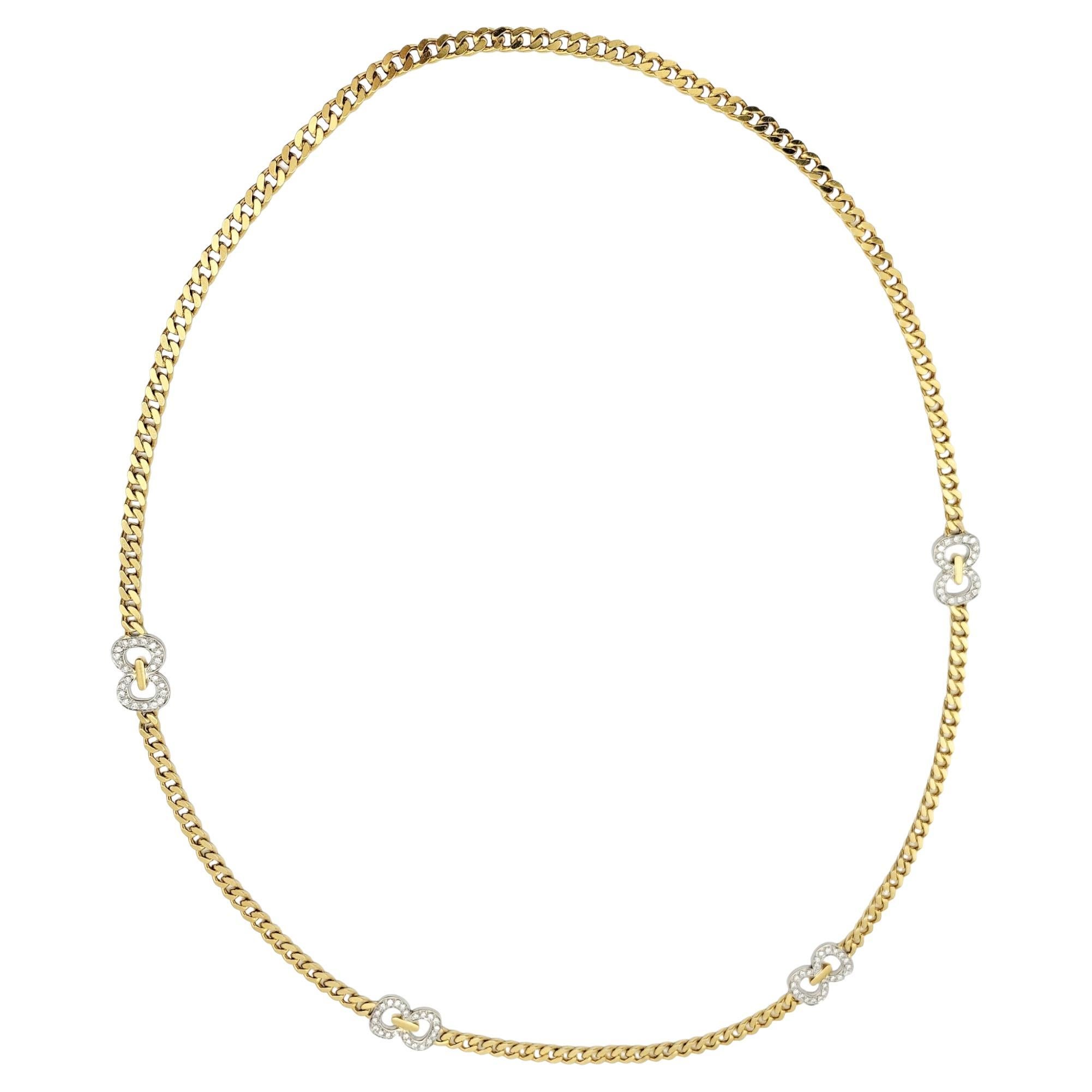 Cuban Link Necklace with Diamond Infinity Stations in 18 Karat Gold