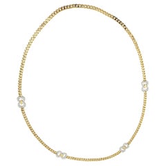 Cuban Link Necklace with Diamond Infinity Stations in 18 Karat Gold