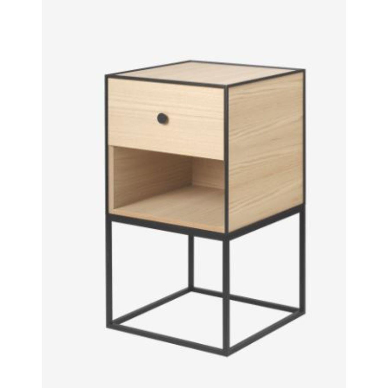 35 oak frame sideboard with 1 drawer by Lassen
Dimensions: W 35 x D 35 x H 63 cm 
Materials: Finér, Melamin, Melamine, Metal, Veneer, Oak
Also available in different colors and dimensions. 
Weight: 15.50 Kg

By Lassen is a Danish design brand