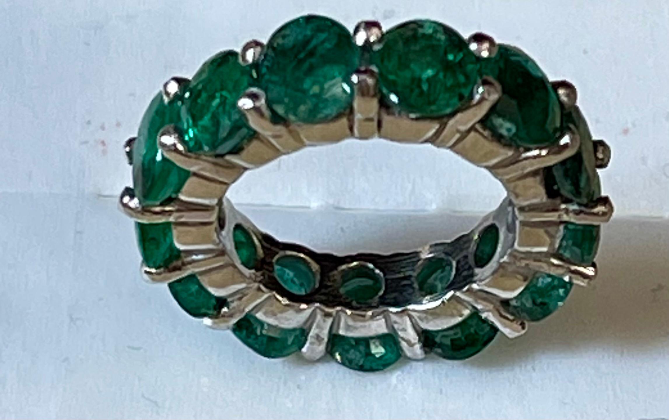
35 Pointer Each 4.5 Carat Emerald Anniversary Eternity Band / Ring in Platinum
Full prong set Emerald  eternity ring set all around with matching 100% natural Emeralds  in hand-polished made in platinum
6 mm Wide band 
This eternity band features