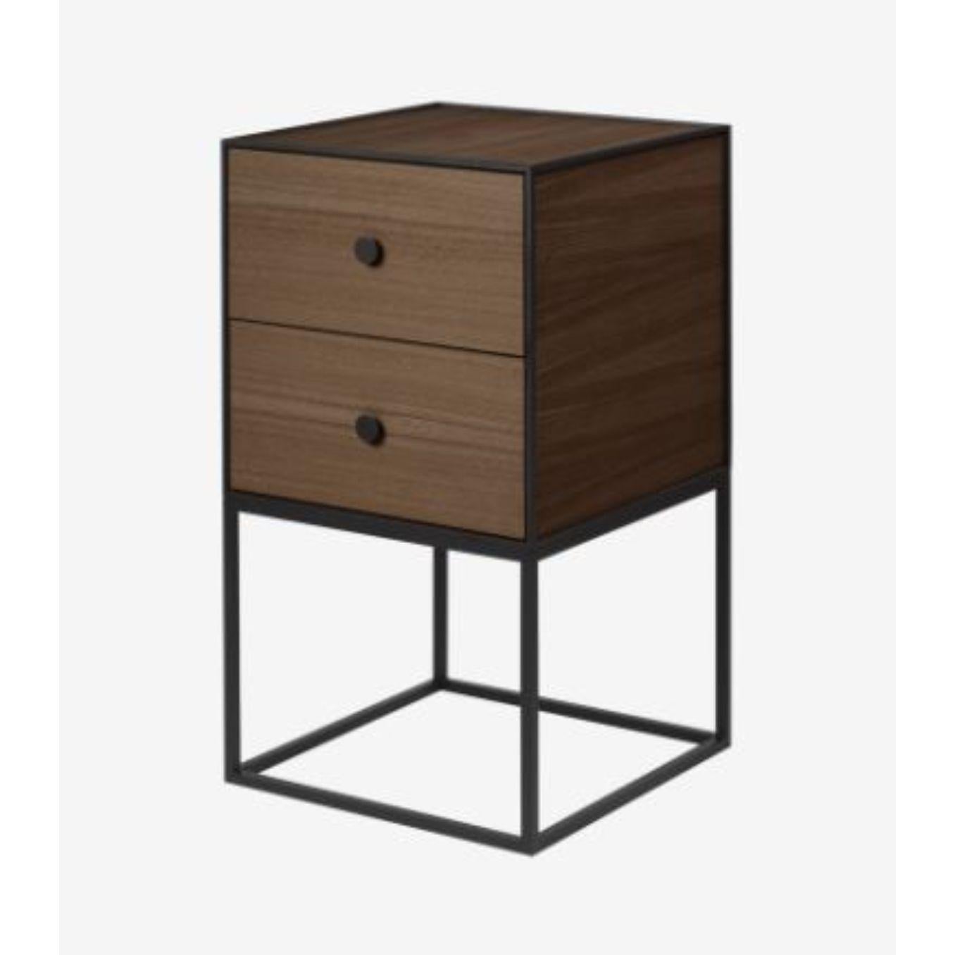 35 smoked oak frame sideboard with 2 drawers by Lassen
Dimensions: D 35 x W 35 x H 63 cm 
Materials: Finér, Melamin, Melamine, Metal, Veneer, Oak
Also available in different colors and dimensions. 
Weight: 15.50 Kg

By Lassen is a Danish