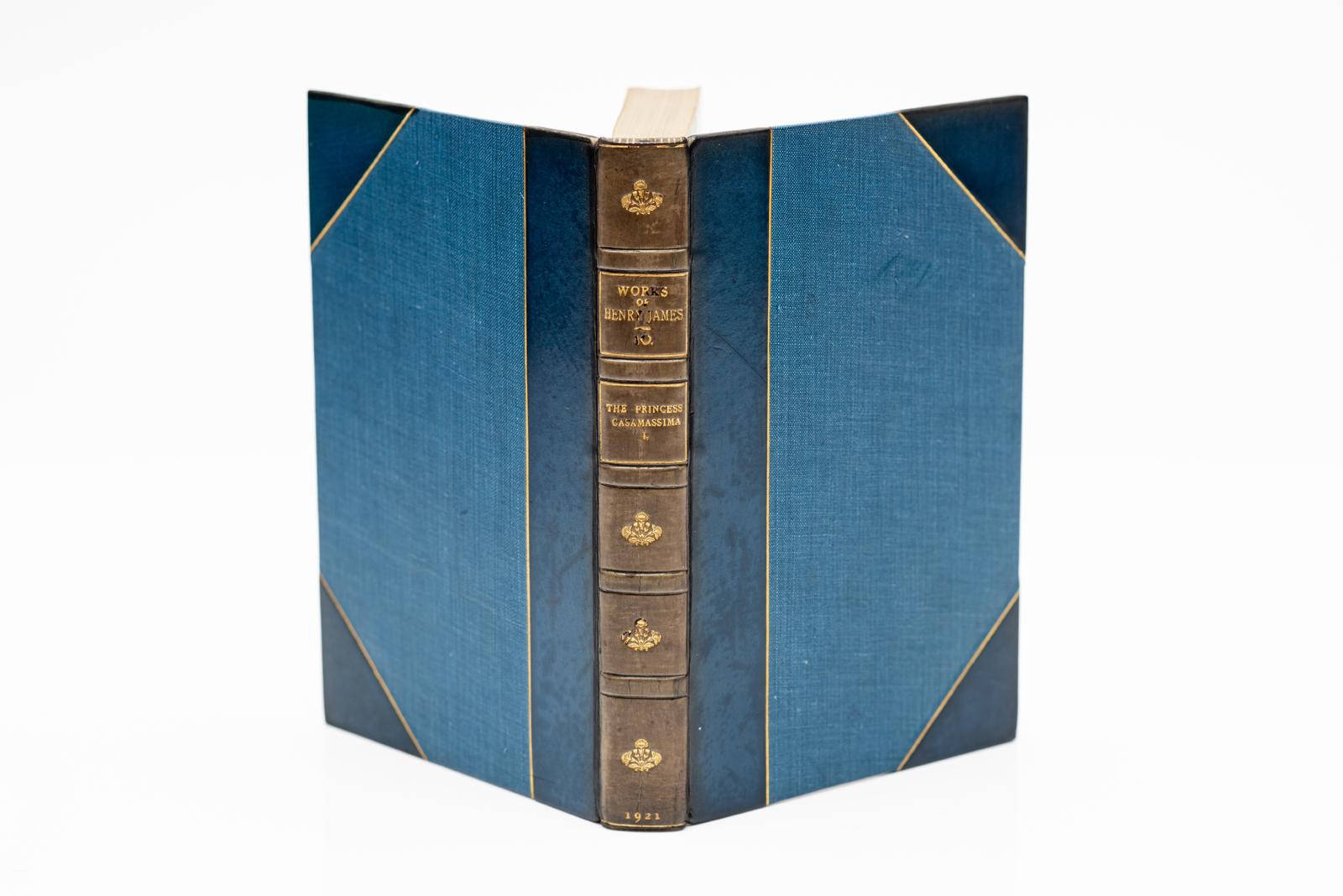 35 Volumes. Henry James. Complete Works. Bound in 3/4 blue calf by Bickers, linen boards, top edges gilt, raised bands, gilt panels, marbled endpapers(spines faded to a lighter blue)
Published: London: MacMillan & Co. 1921
H: 7 3/4