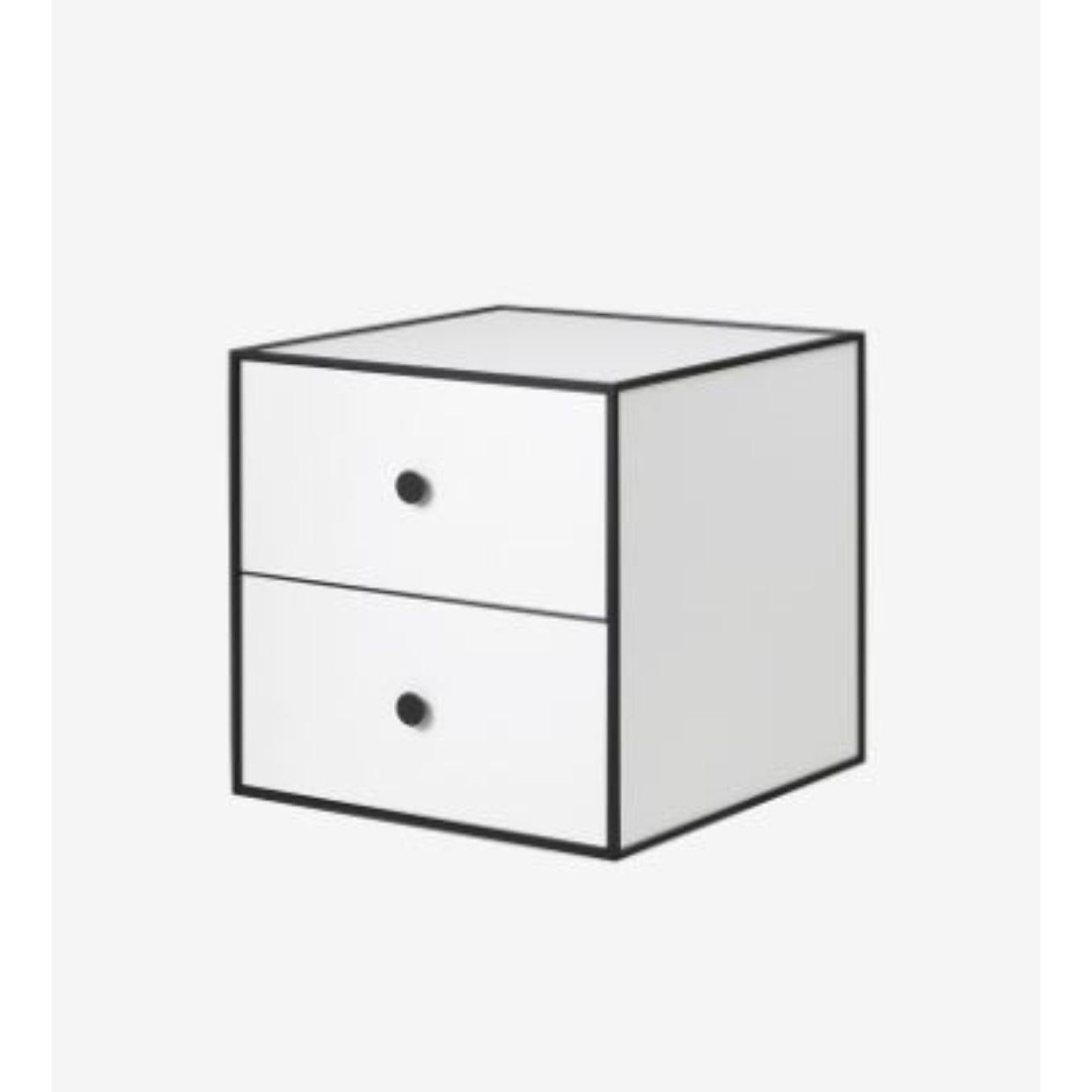 35 White frame box with 2 drawer by Lassen.
Dimensions: W 35 x D 35 x H 35 cm.
Materials: Finér, Melamin, Melamin, Melamine, Metal, Veneer
Also available in different colors and dimensions. 
Weight: 10.50, 10.50, 11.50, 11.50 Kg

Frame