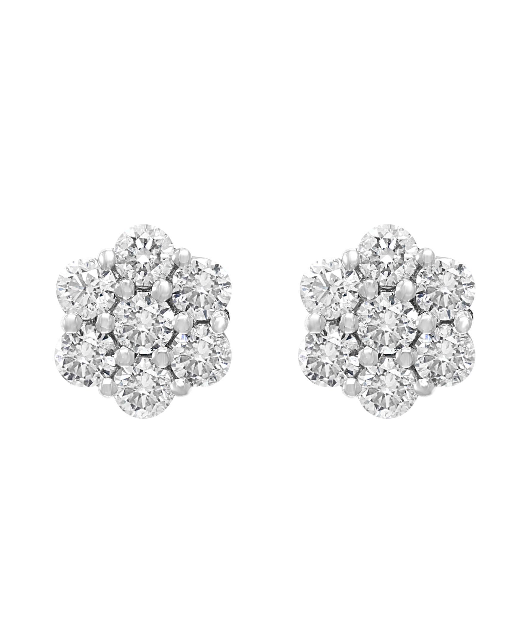 A sweet, shimmery style for any day of the week. 
These stud earrings blossom floral clusters of  2.8 ct. total weight. 
Round brilliant-cut diamonds. Set in 14kt White gold. 
Post and Screw back 
It's  a unique and playful option. 
Classic elegance