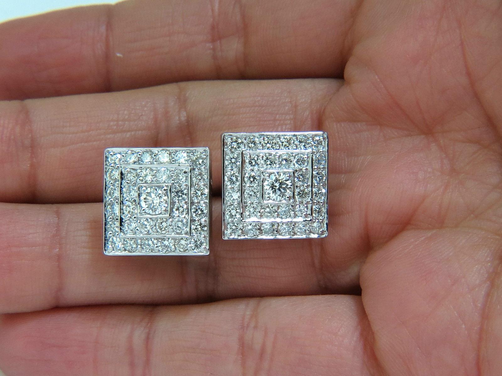 Art-Deco Square 

Three tiered step

3.50ct. Round, Full cut diamonds square cluster earrings.

 G-color, Vs-2 clarity.

Bead set (pave) by hand.

Overall:

15.6mm wide

comfortable and secure omega clip

11.7 grams.

$11,000 appraisal will accompany