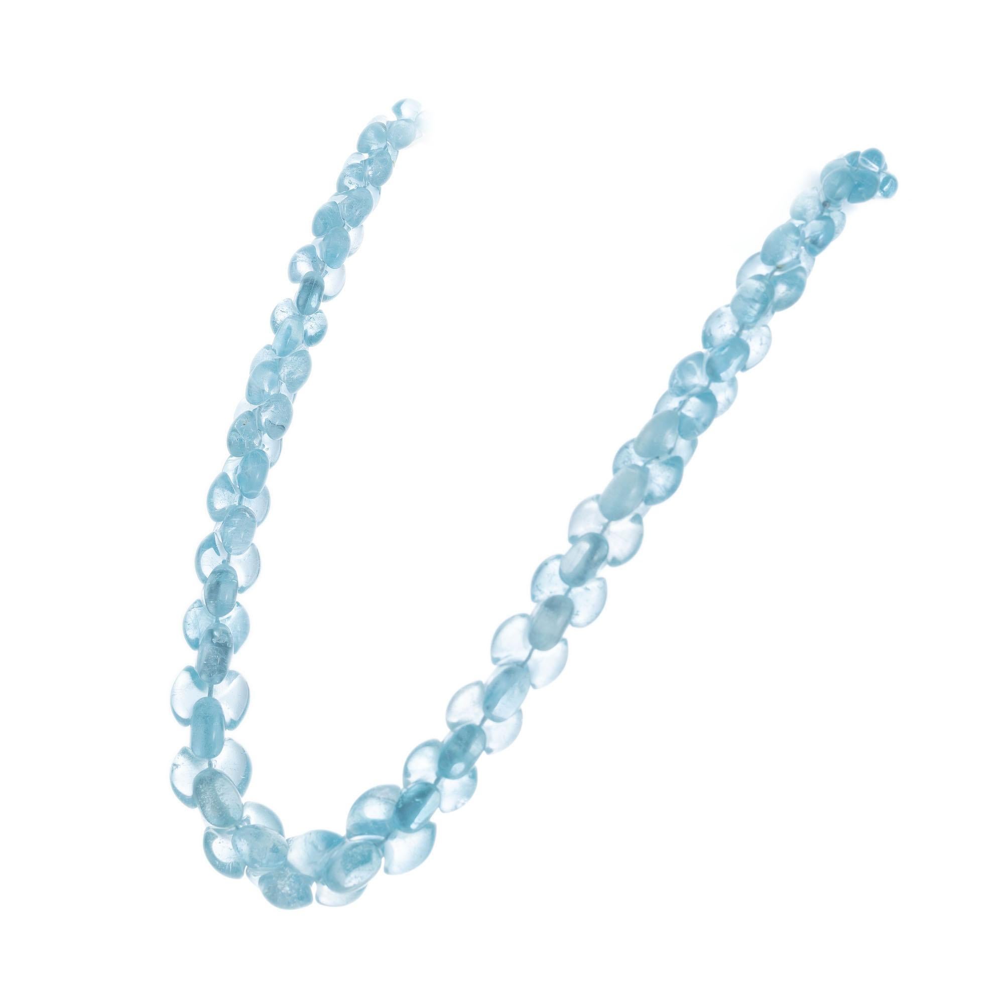 Natural Earth mined untreated blue topaz bow tie style 18 Inch bead necklace with 14k white gold catch.

78 briolette shape light blue topaz beads, approx. 350cts
14k white gold 
Stamped: 14k
107.1 grams
Chain: 18 Inches graduating 9mm-15mm


