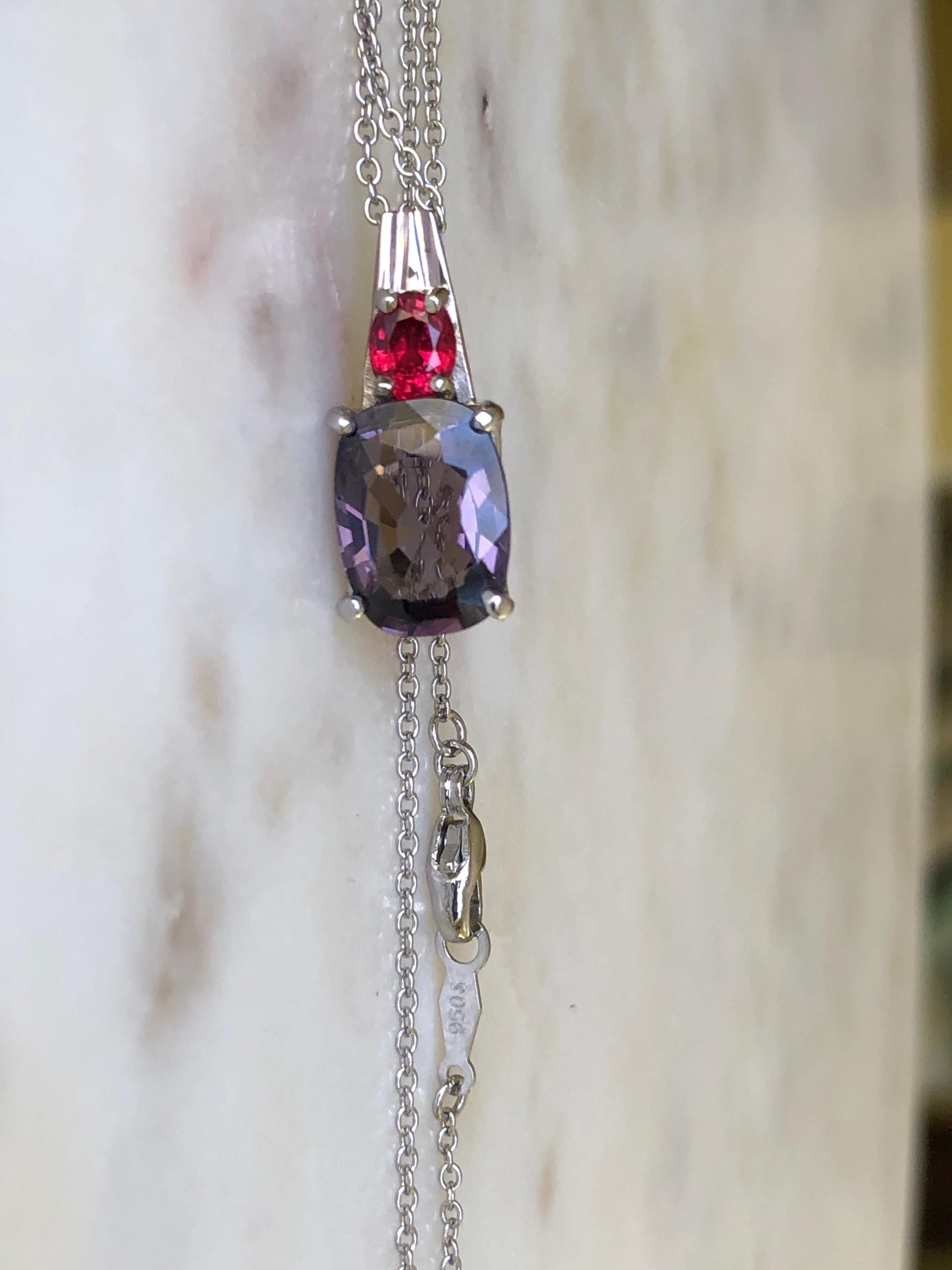 Natural Burmese purple spinel with a red accent spinel drop pendant necklace platinum and 18K white gold
The natural Burmese spinel cushion-cut, purple color /clarity VS, weight approx. 3.00 carat with a red accent spinel. The bright red spinel is