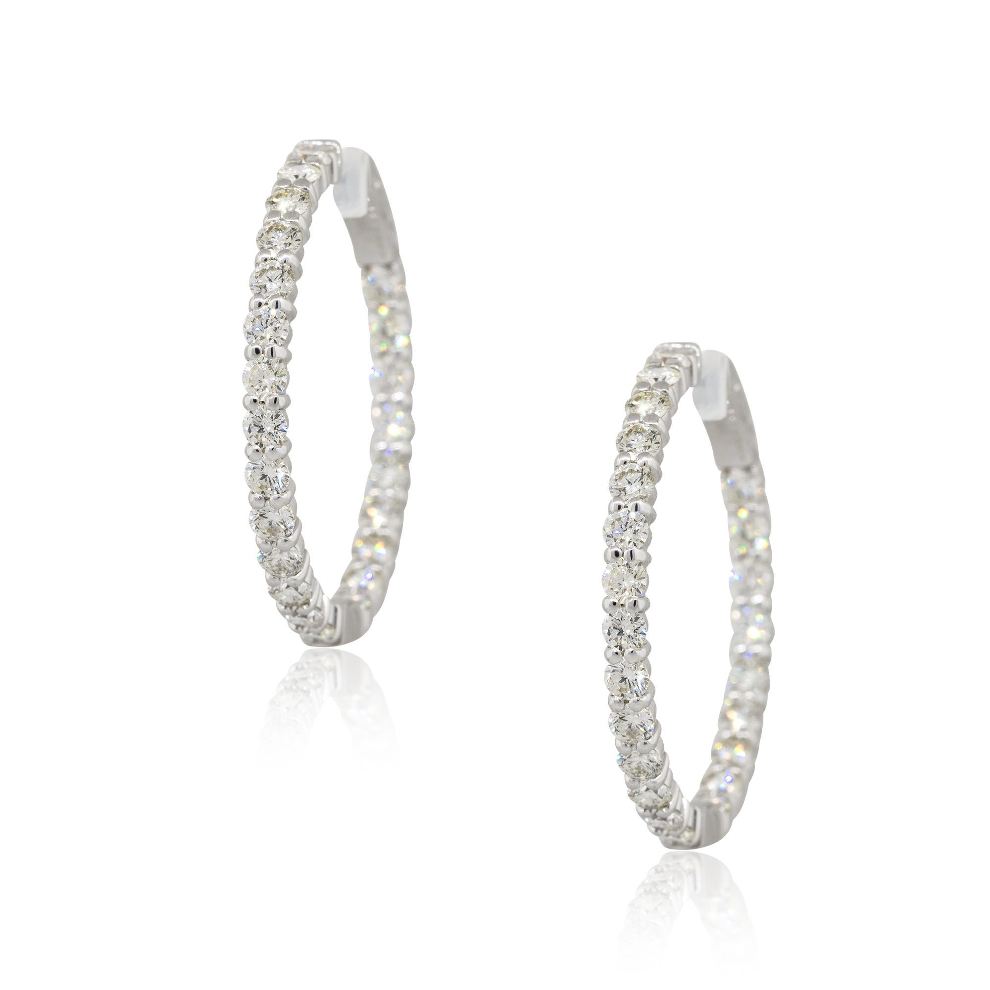 Material: 14k White Gold
Diamond Details: Approx. 3.50ct of round cut diamonds. Diamonds are G/H in color and VS in clarity. 46 stones 
Earring Measurements: 30.60mm x 30.45mm x 2.80mm
Total Weight: 8.2g (5.2dwt) 
Earring backs: Hinged