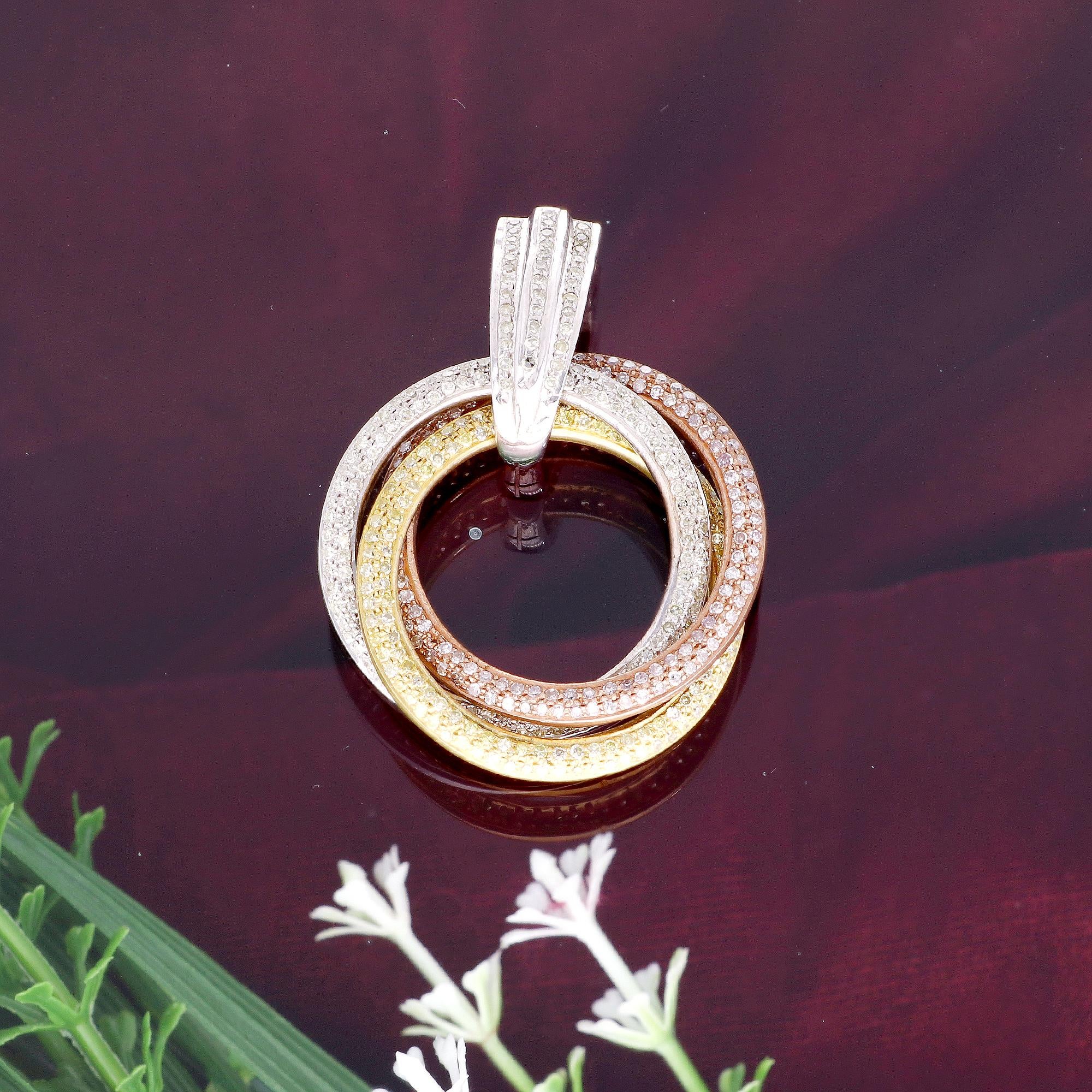 Embrace the allure of this captivating three-circle tri-tone pendant, adorned with a magnificent 3.50 carat diamond pave. Meticulously handcrafted, this exquisite piece of jewelry showcases exceptional artistry, sophistication, and undeniable