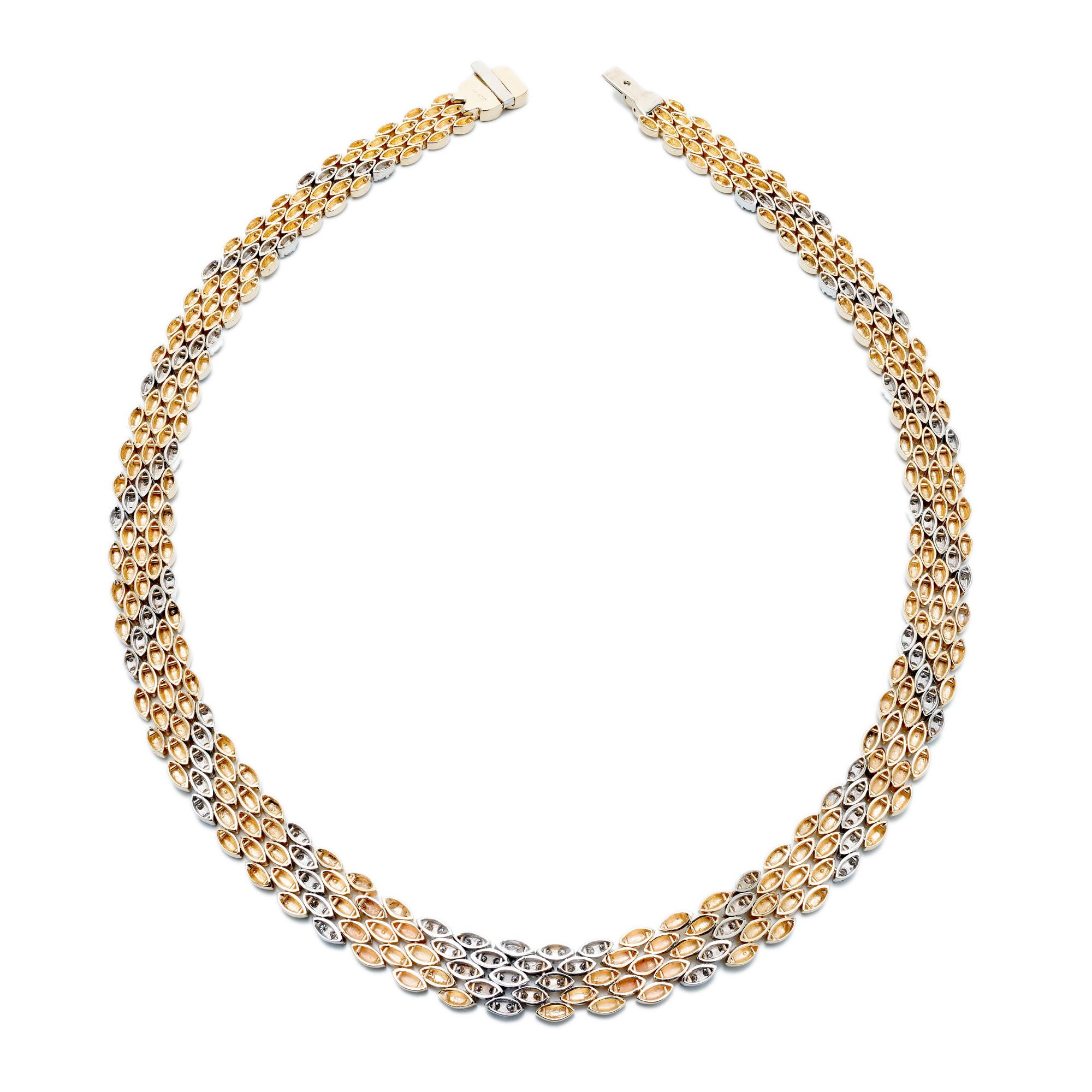 Collana a cinque file di pantere in oro giallo 14k lunga 18 pollici con sezioni in oro bianco arricchite da 170 diamanti rotondi taglio brillante. Gancio incorporato con sicurezza inferiore.

170 diamanti rotondi taglio brillante, H-I VS-SI circa