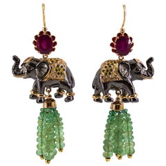 Vintage 35.0 Carat Emerald 6.20 Carat Ruby Diamond Yellow Gold Elephant Stud Earrings