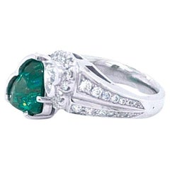 3.50 carat Heart Shape Vivid Green Emerald and a Heart Shape Diamond Ring