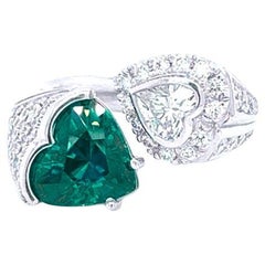 3.50 carat Heart Shape Vivid Green Emerald and a Heart Shape Diamond Ring