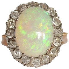 3.50 Carat Opal Yellow Gold and White Gold Prongs
